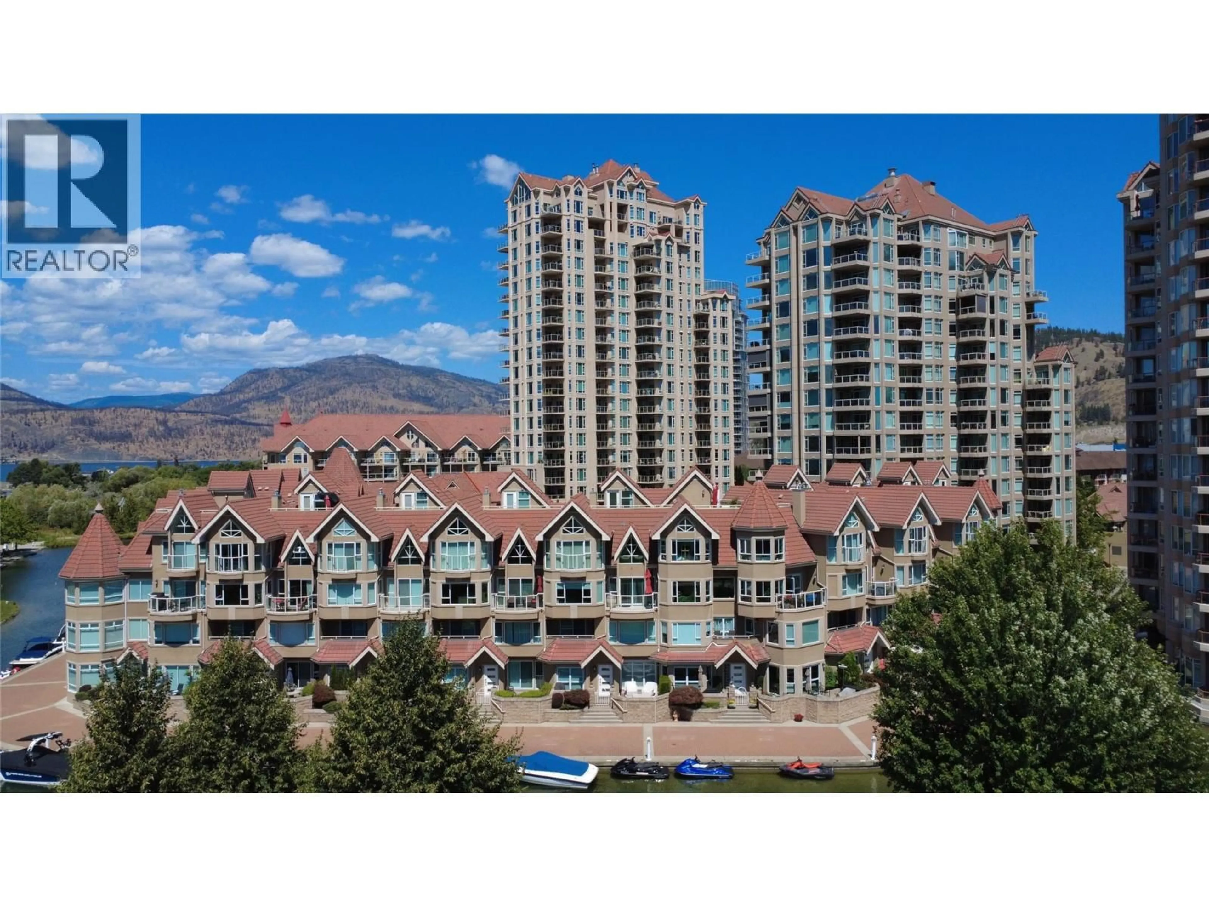 A pic from outside/outdoor area/front of a property/back of a property/a pic from drone, mountain view for 115 - 1156 SUNSET DRIVE, Kelowna British Columbia V1Y9R7