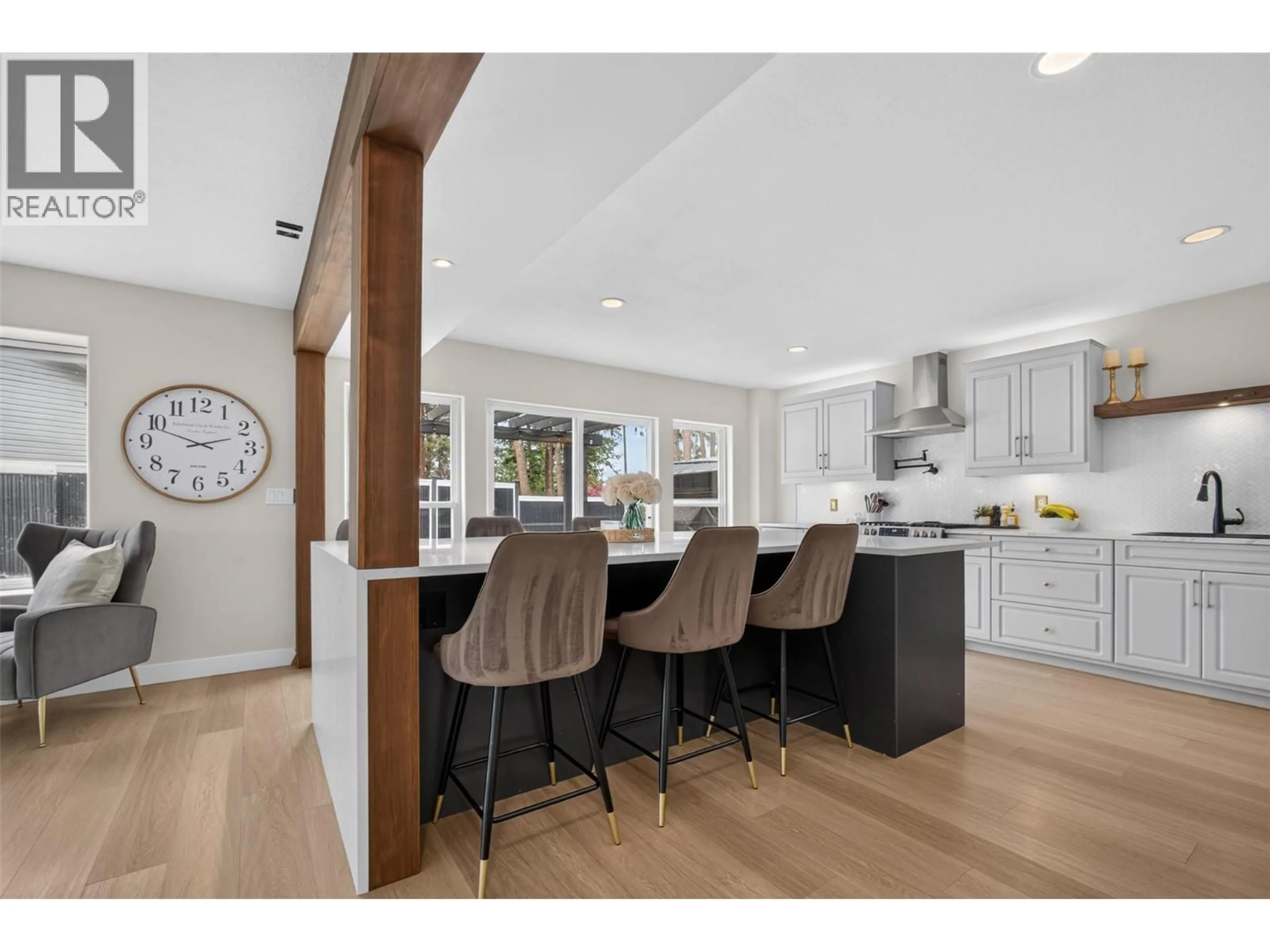 Open concept kitchen, wood/laminate floor for 2330 SHANNON WOODS DRIVE, West Kelowna British Columbia V4T2P1