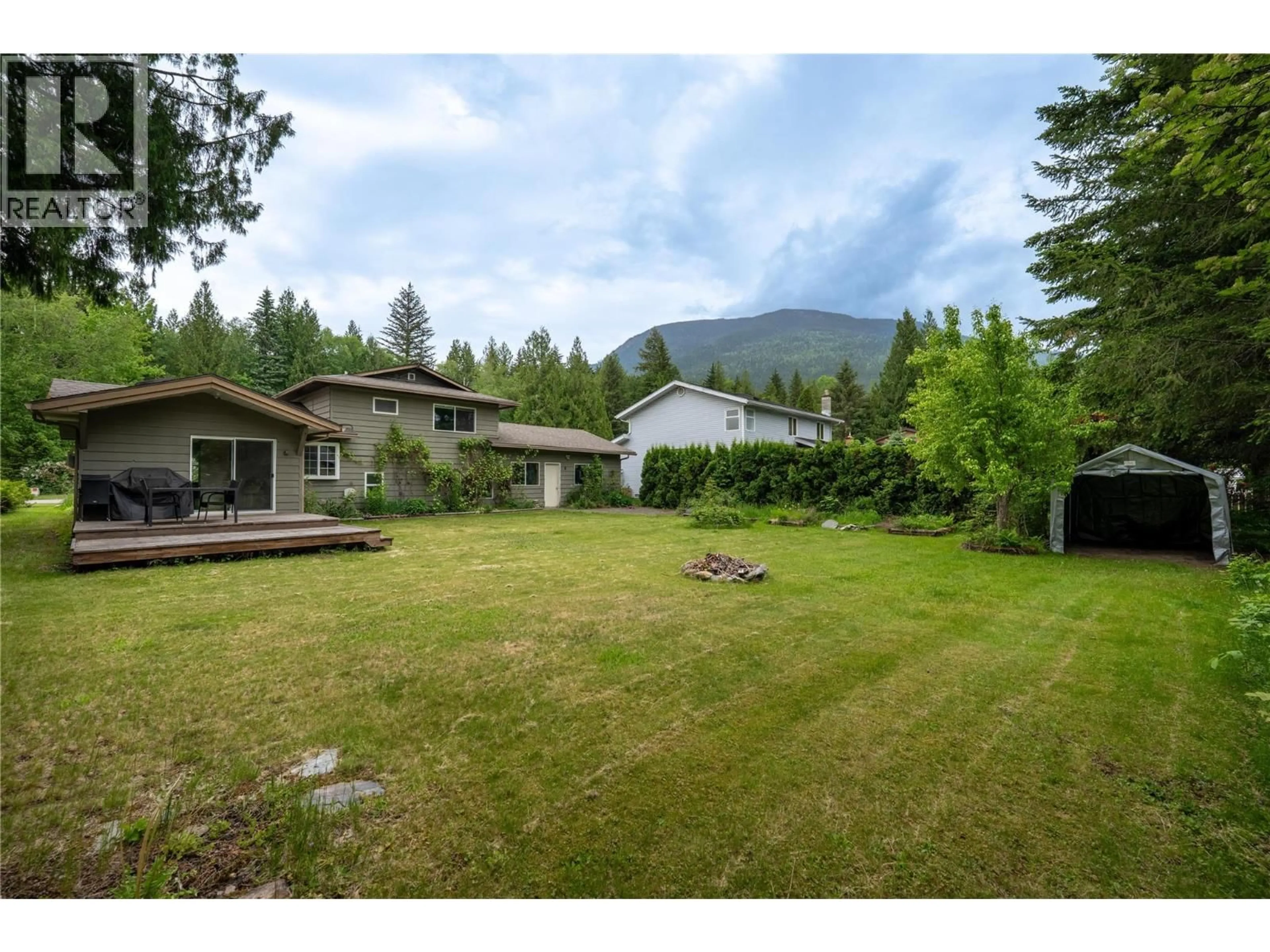 A pic from outside/outdoor area/front of a property/back of a property/a pic from drone, mountain view for 1897 FOREST DRIVE, Revelstoke British Columbia V0E2S1