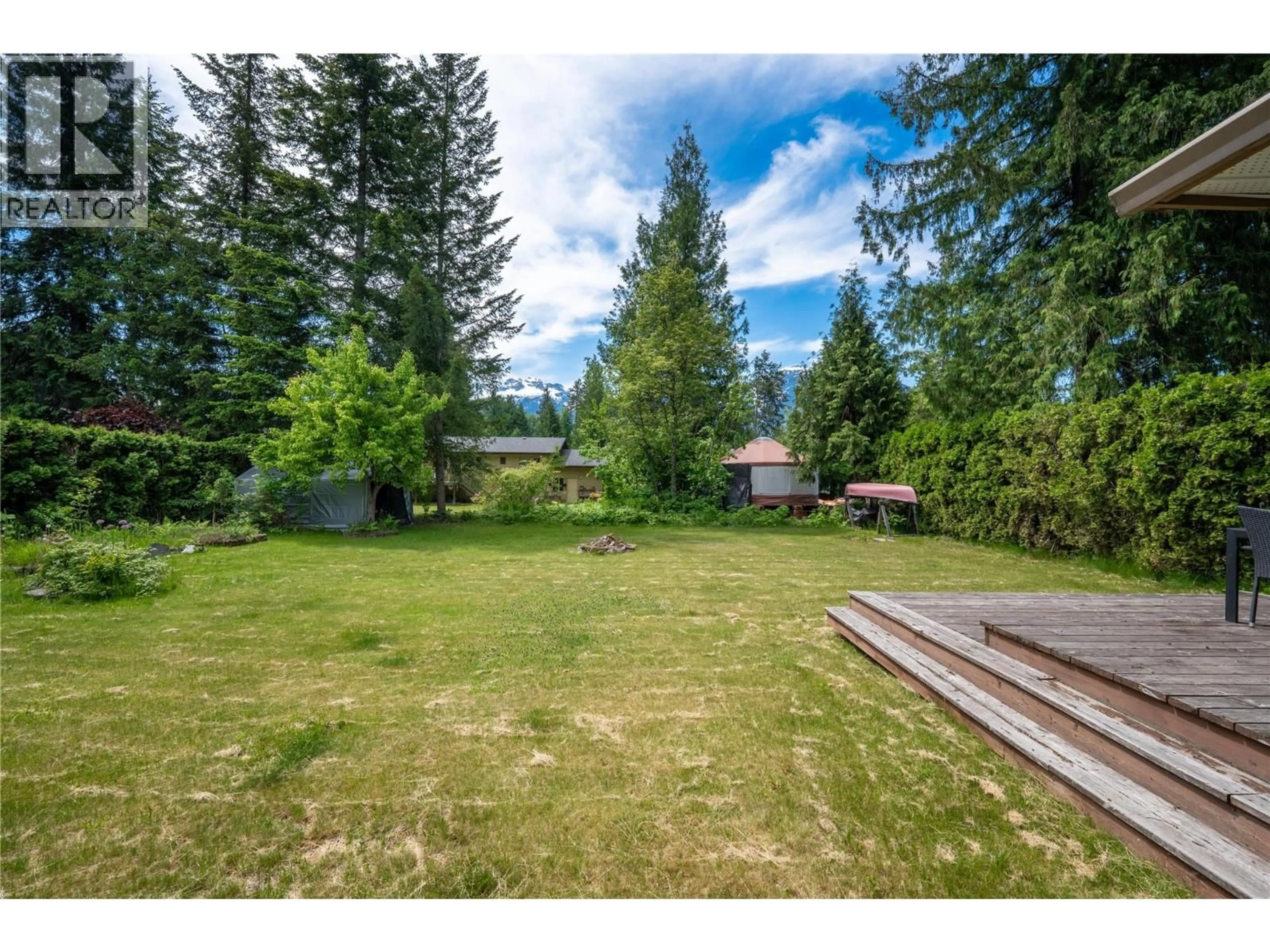 A pic from outside/outdoor area/front of a property/back of a property/a pic from drone, forest/trees view for 1897 FOREST DRIVE, Revelstoke British Columbia V0E2S1