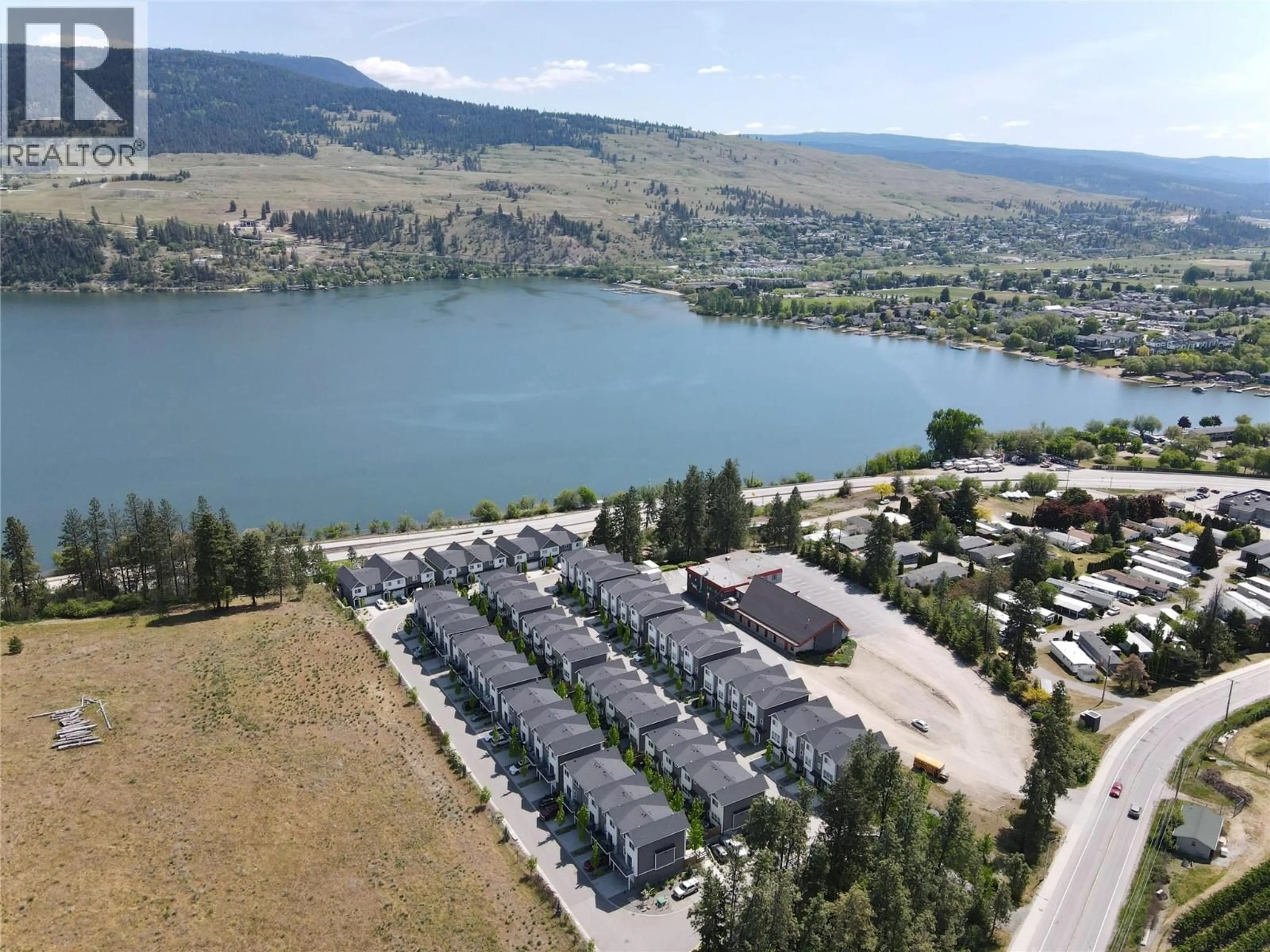 A pic from outside/outdoor area/front of a property/back of a property/a pic from drone, water/lake/river/ocean view for 28 - 12075 OCEOLA ROAD, Lake Country British Columbia V4V1H1