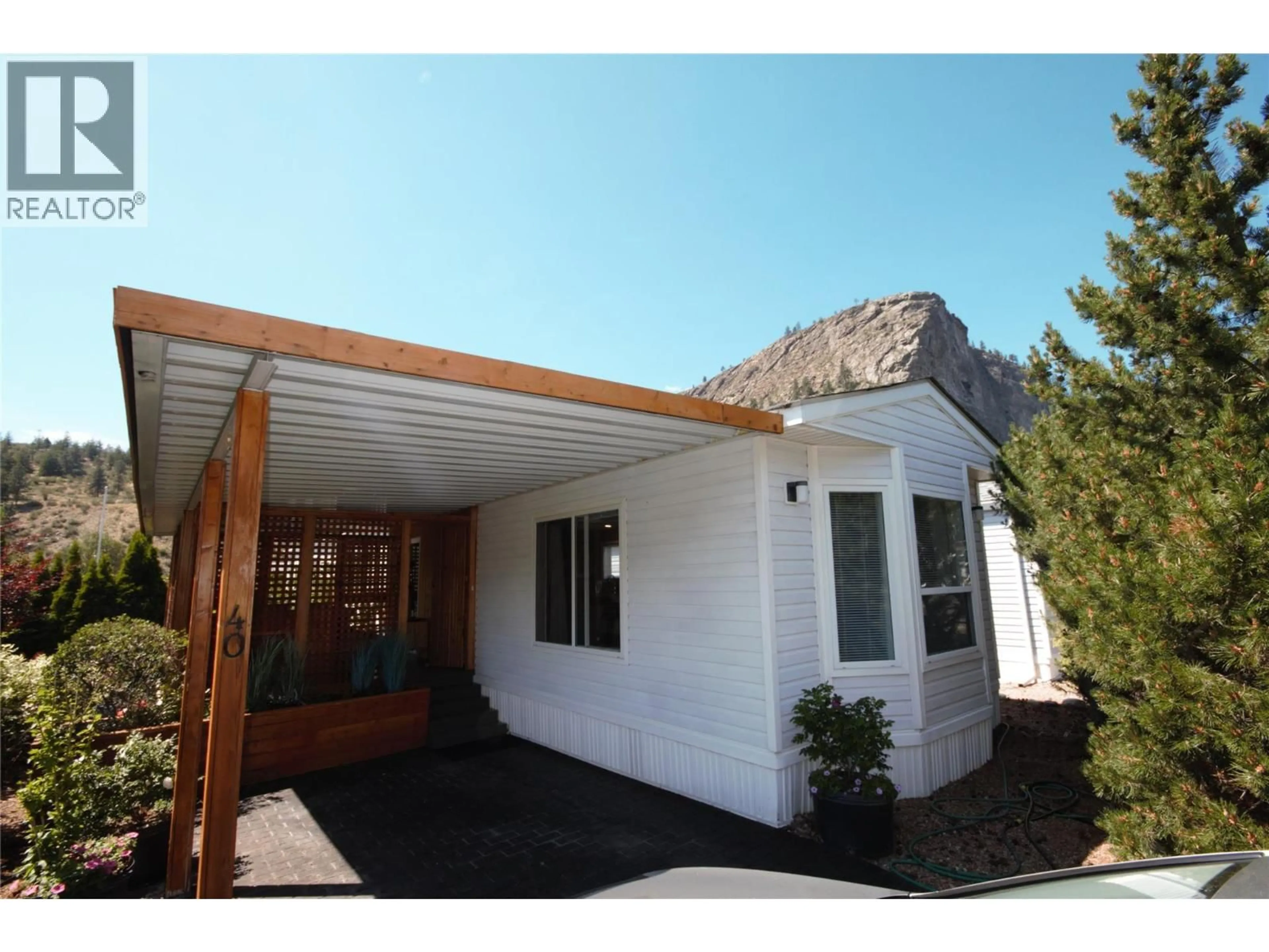 Home with vinyl exterior material, street for 40 - 8598 HIGHWAY 97 OTHER, Oliver British Columbia V0H1T2