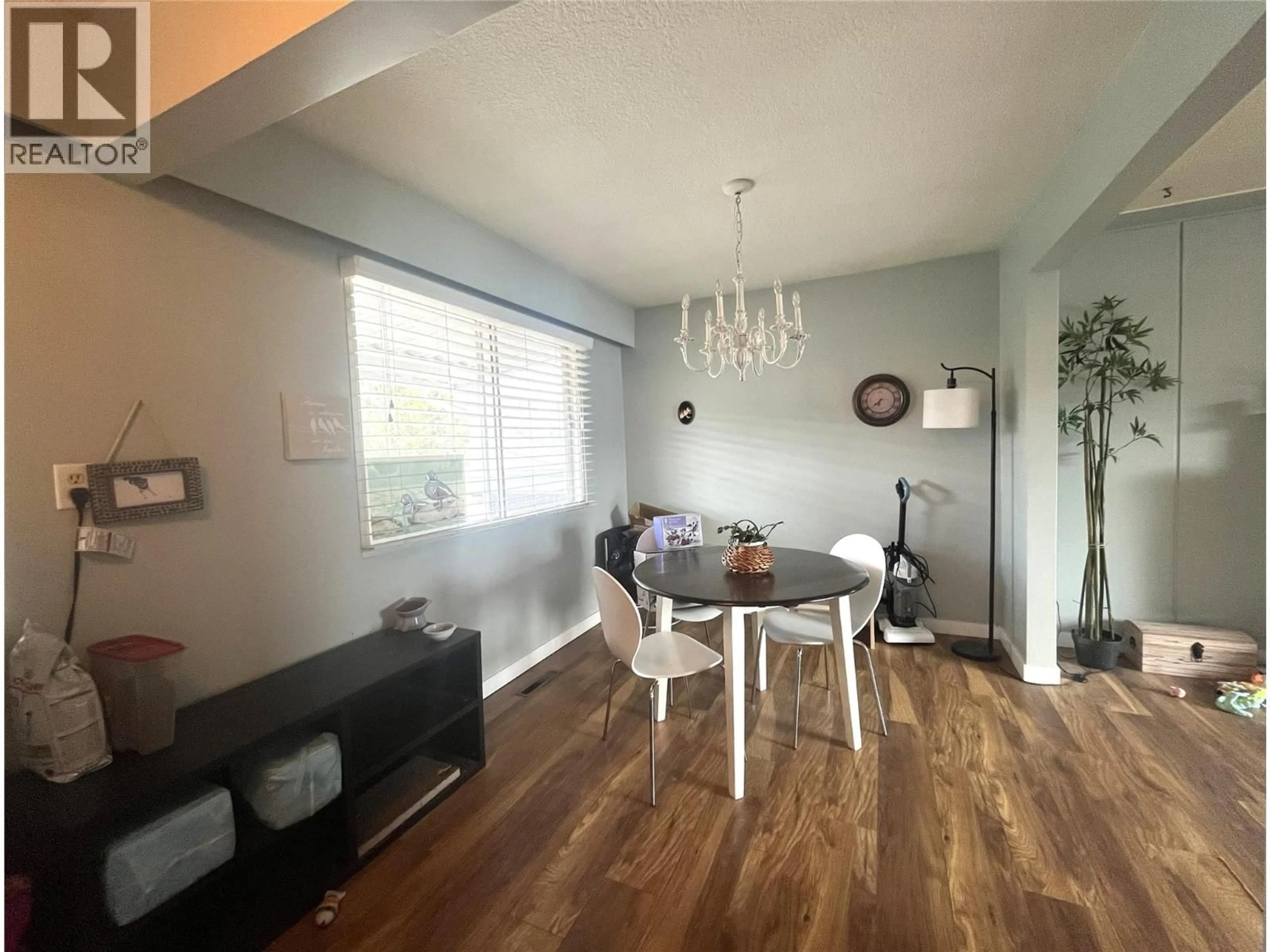 Dining room, wood/laminate floor for 670 PATRICIA AVENUE, Kamloops British Columbia V2B1Y8