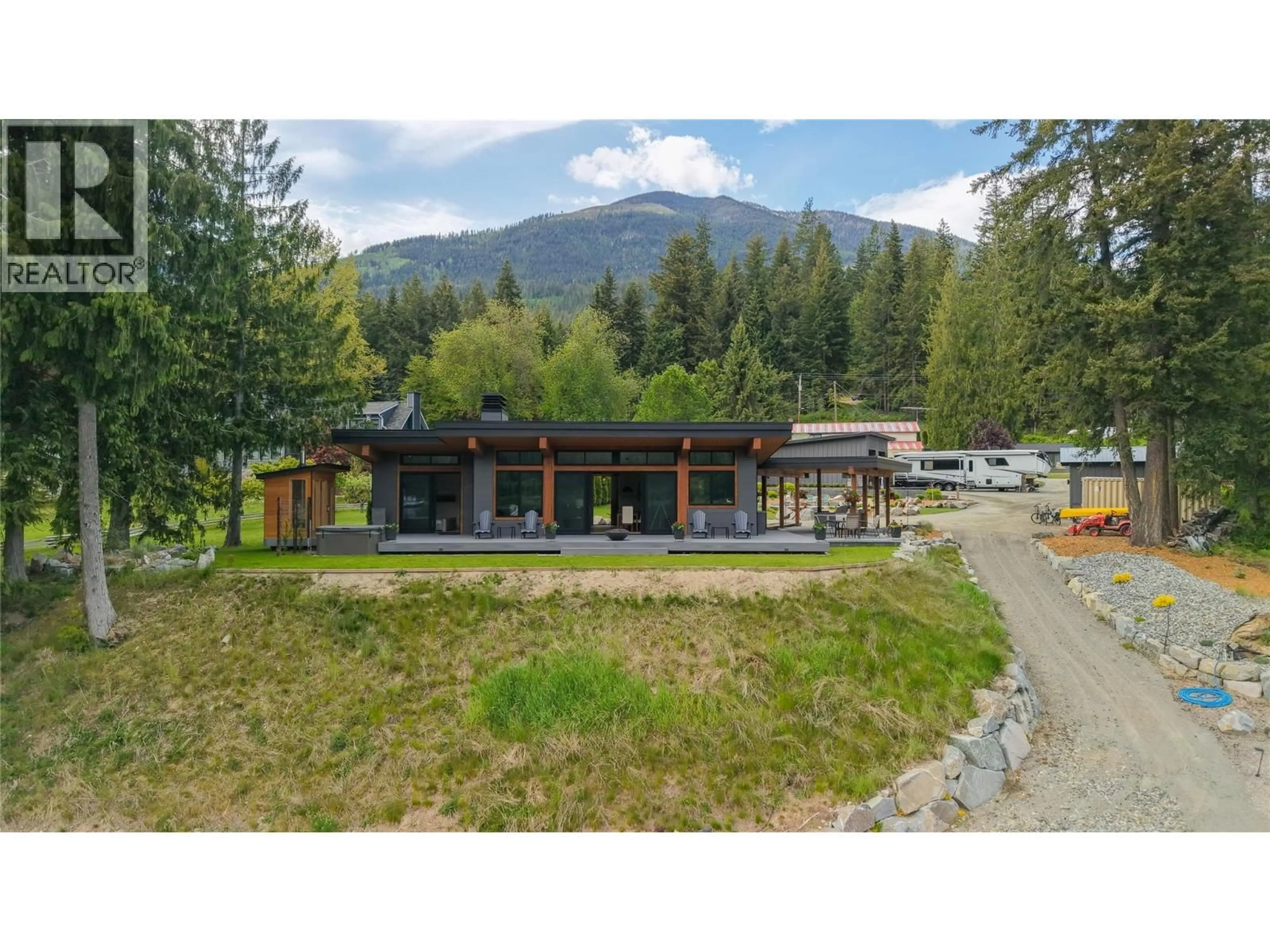 A pic from outside/outdoor area/front of a property/back of a property/a pic from drone, mountain view for 7642 HIGHWAY 3A OTHER, Balfour British Columbia V0G1C0