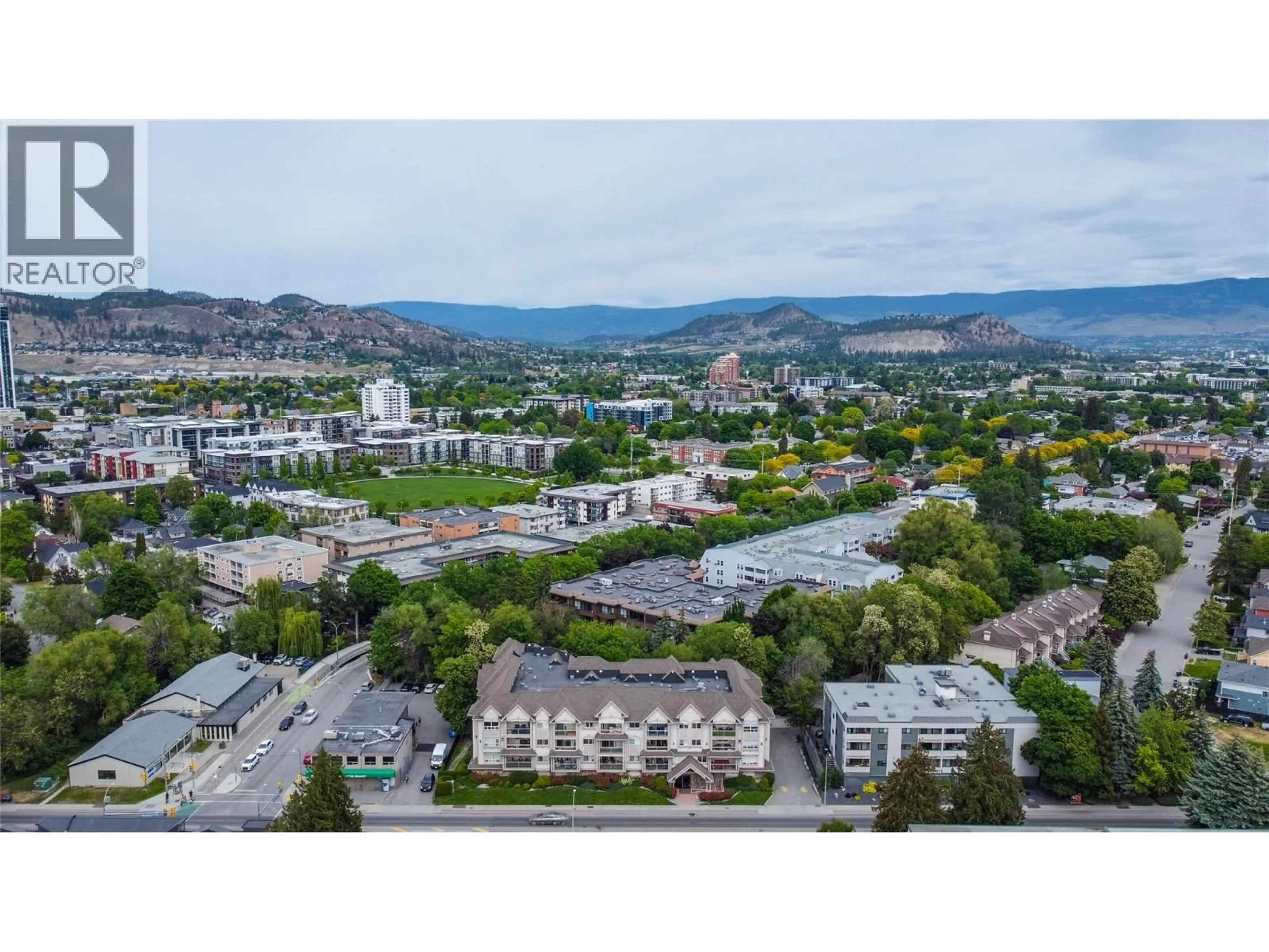 A pic from outside/outdoor area/front of a property/back of a property/a pic from drone, mountain view for 105 - 1965 PANDOSY STREET, Kelowna British Columbia V1Y1R9