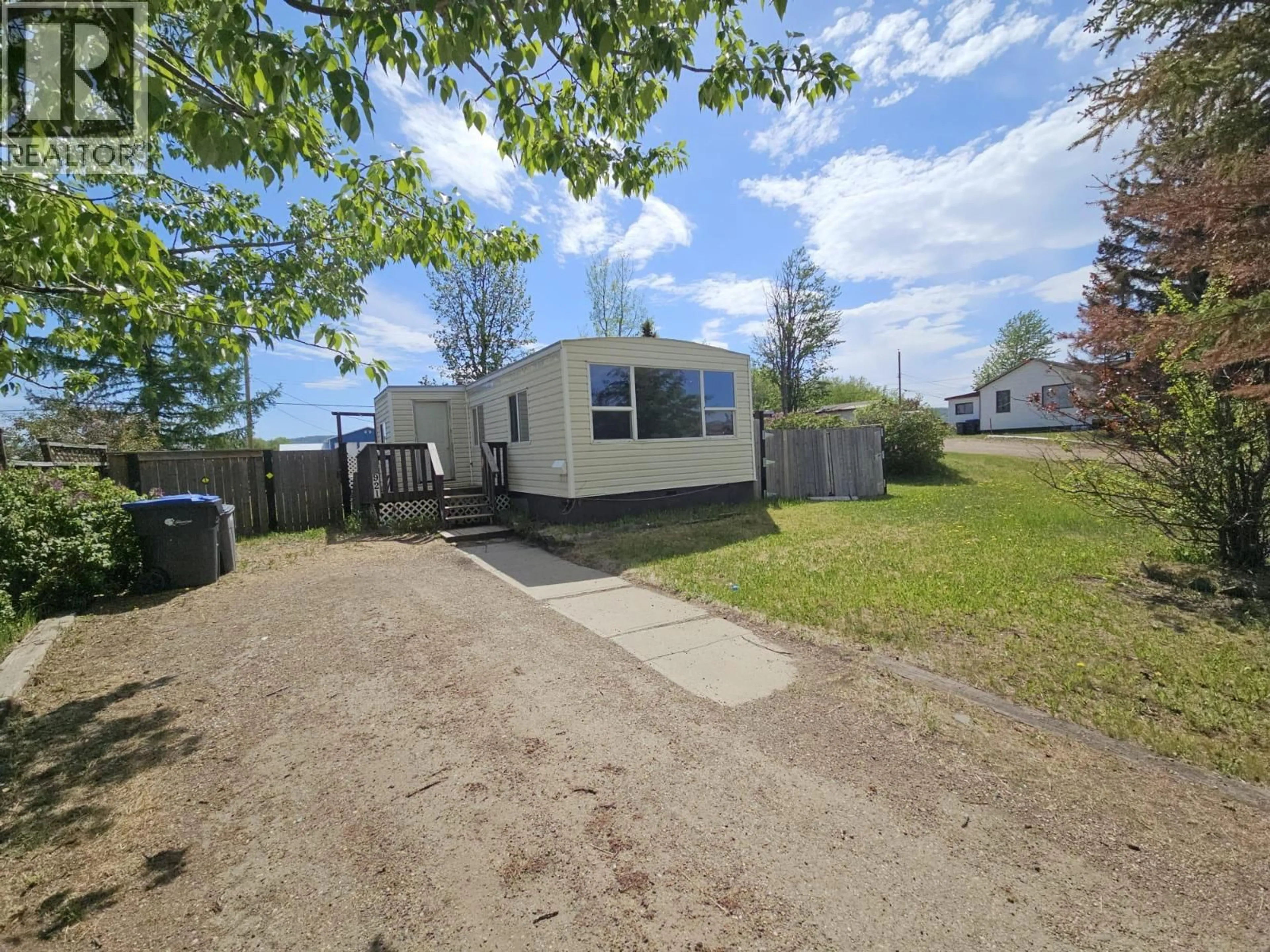 A pic from outside/outdoor area/front of a property/back of a property/a pic from drone, street for 921 121 AVENUE, Dawson Creek British Columbia V1G3K3
