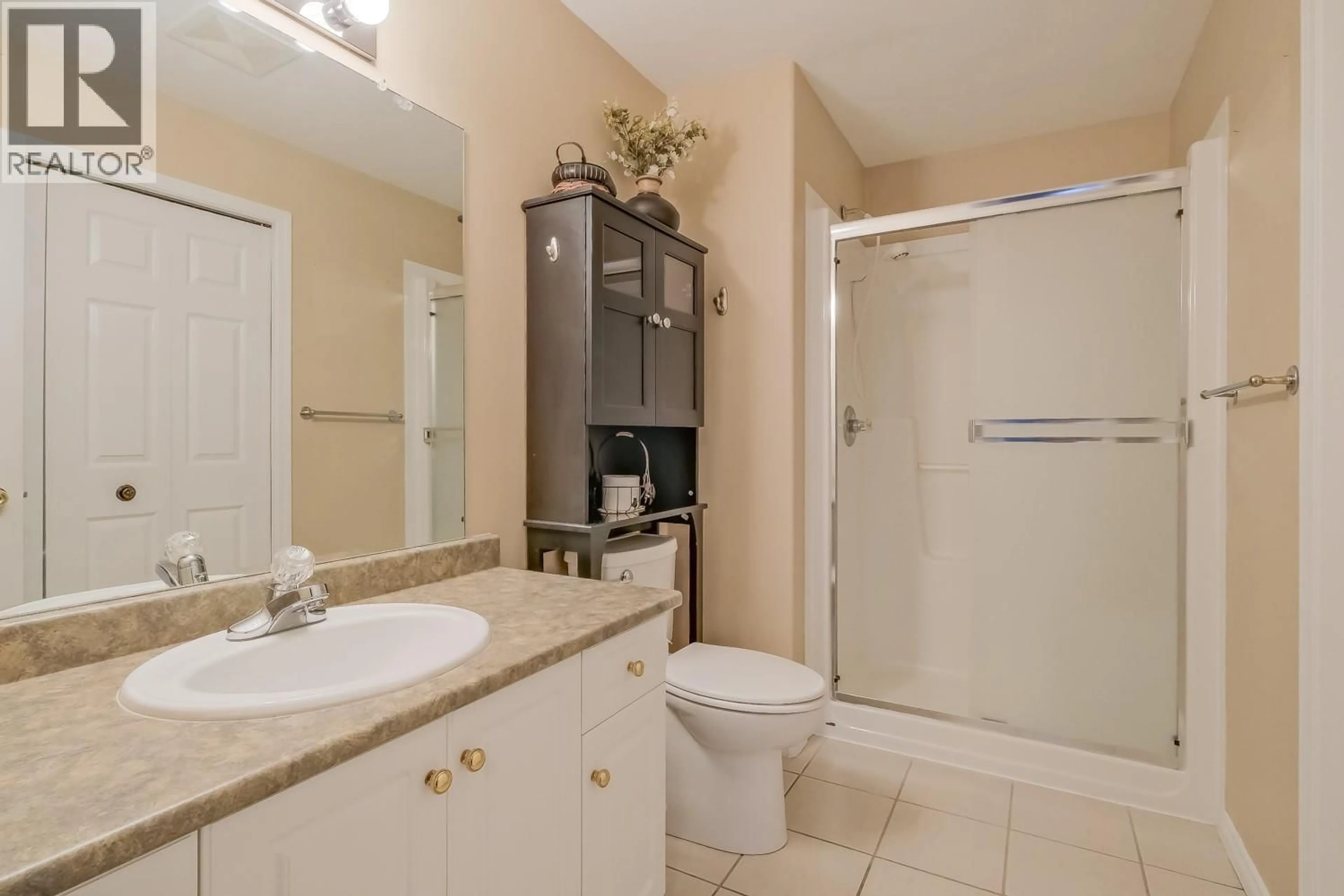 Standard bathroom, ceramic/tile floor for 202 - 2255 ATKINSON STREET, Penticton British Columbia V2A8R7