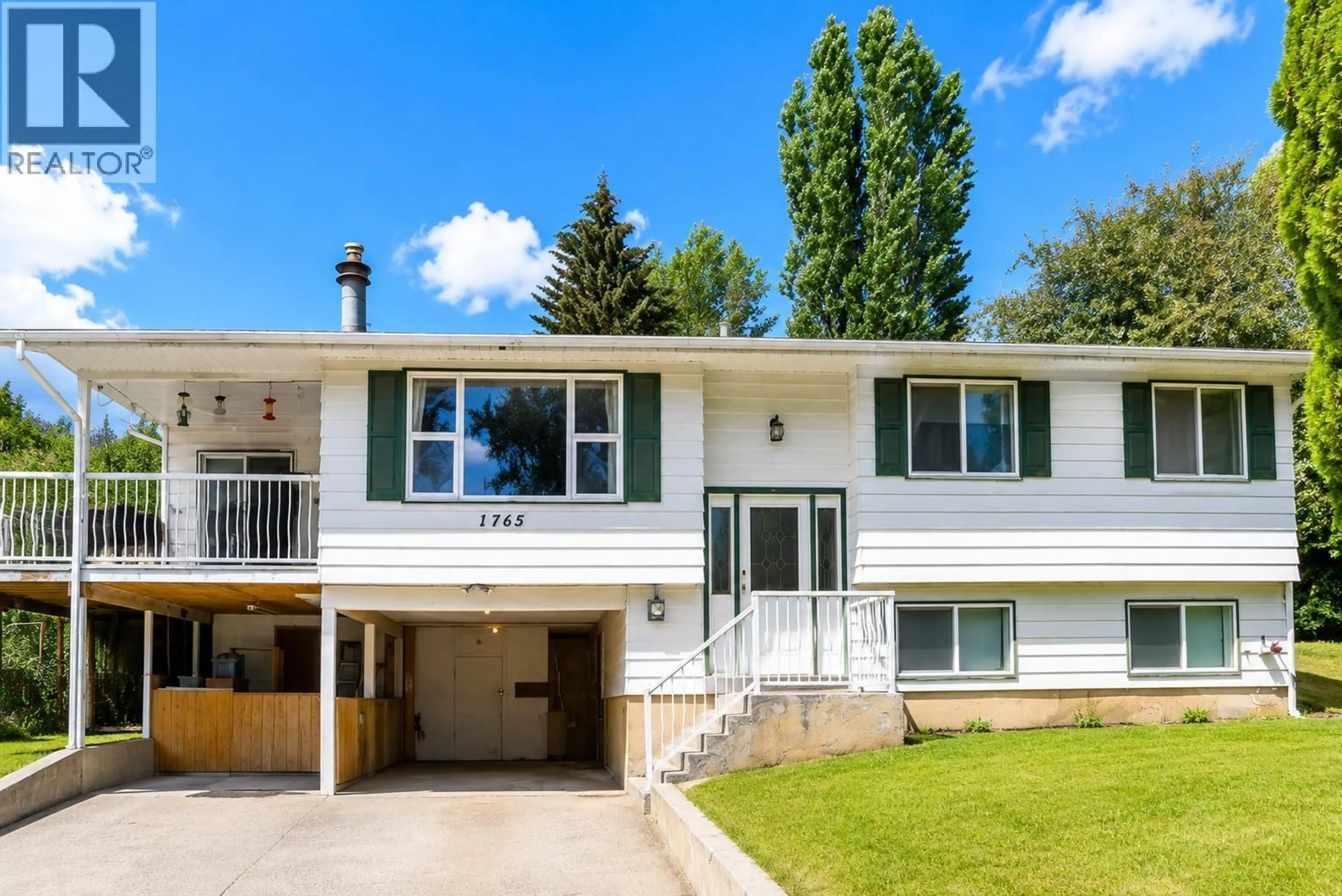 Home with vinyl exterior material, street for 1765 3B HIGHWAY, Fruitvale British Columbia V0G1L0