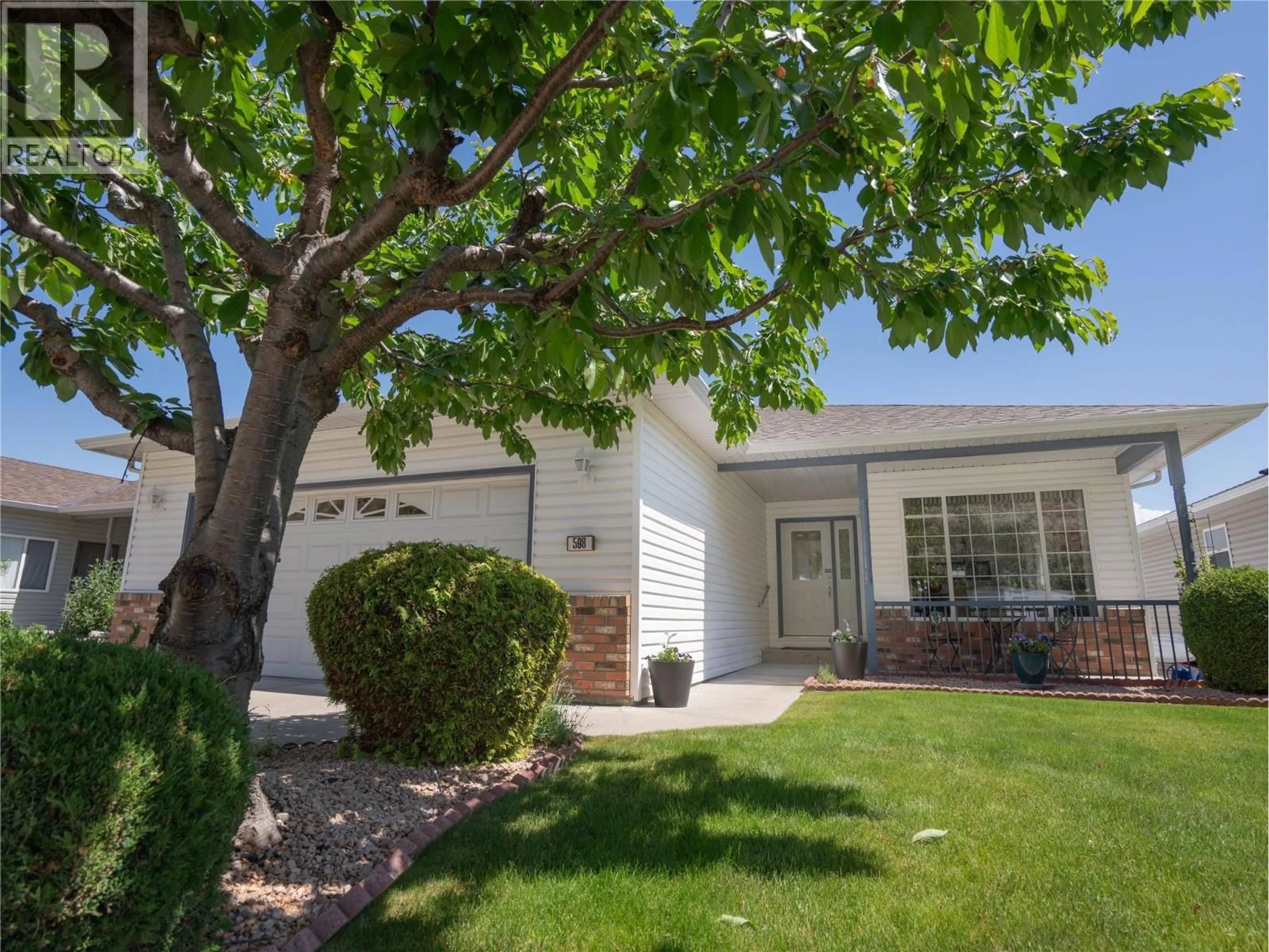 Home with vinyl exterior material, street for 598 RED WING DRIVE, Penticton British Columbia V2A8N7