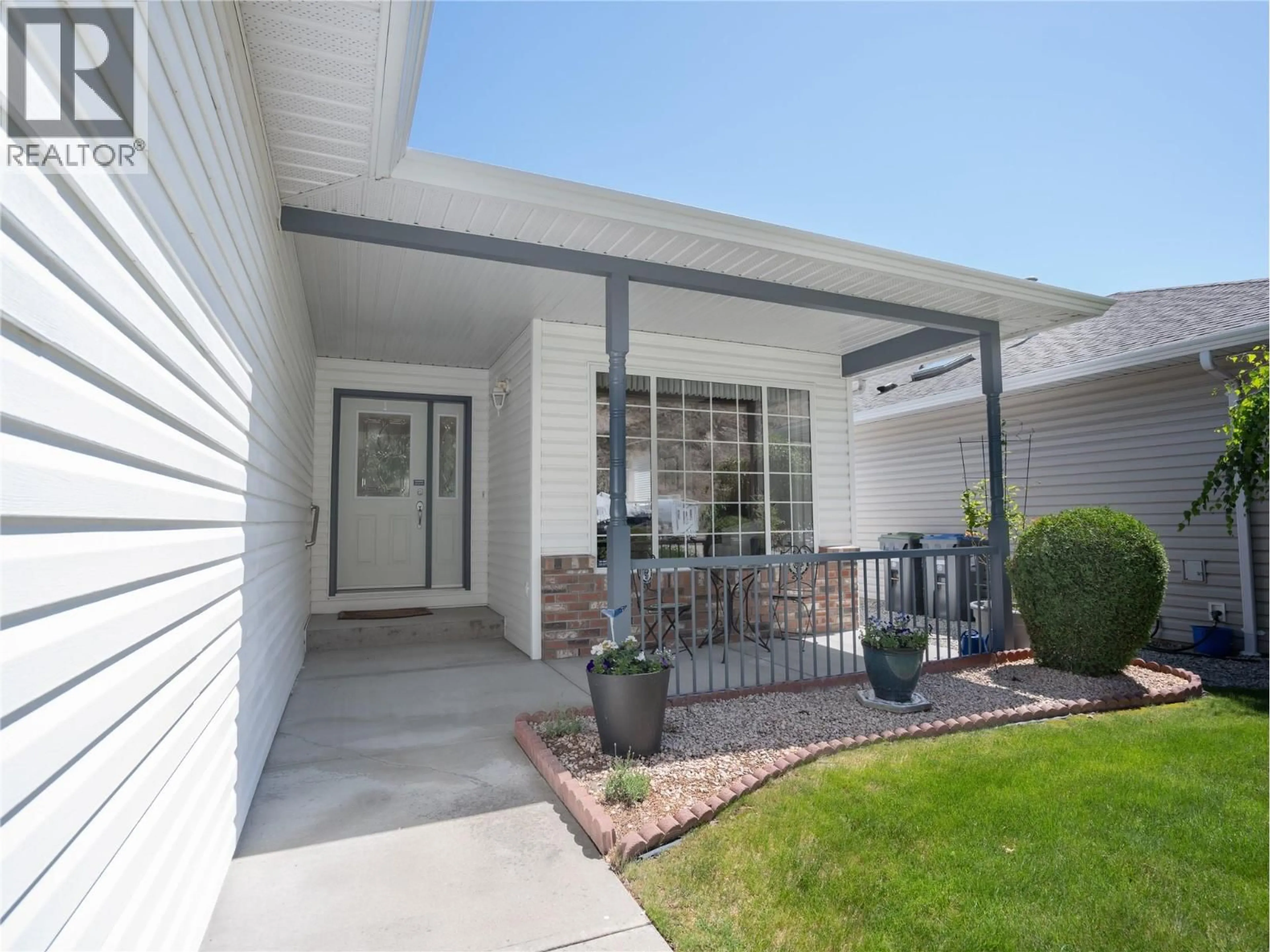 Home with vinyl exterior material, street for 598 RED WING DRIVE, Penticton British Columbia V2A8N7