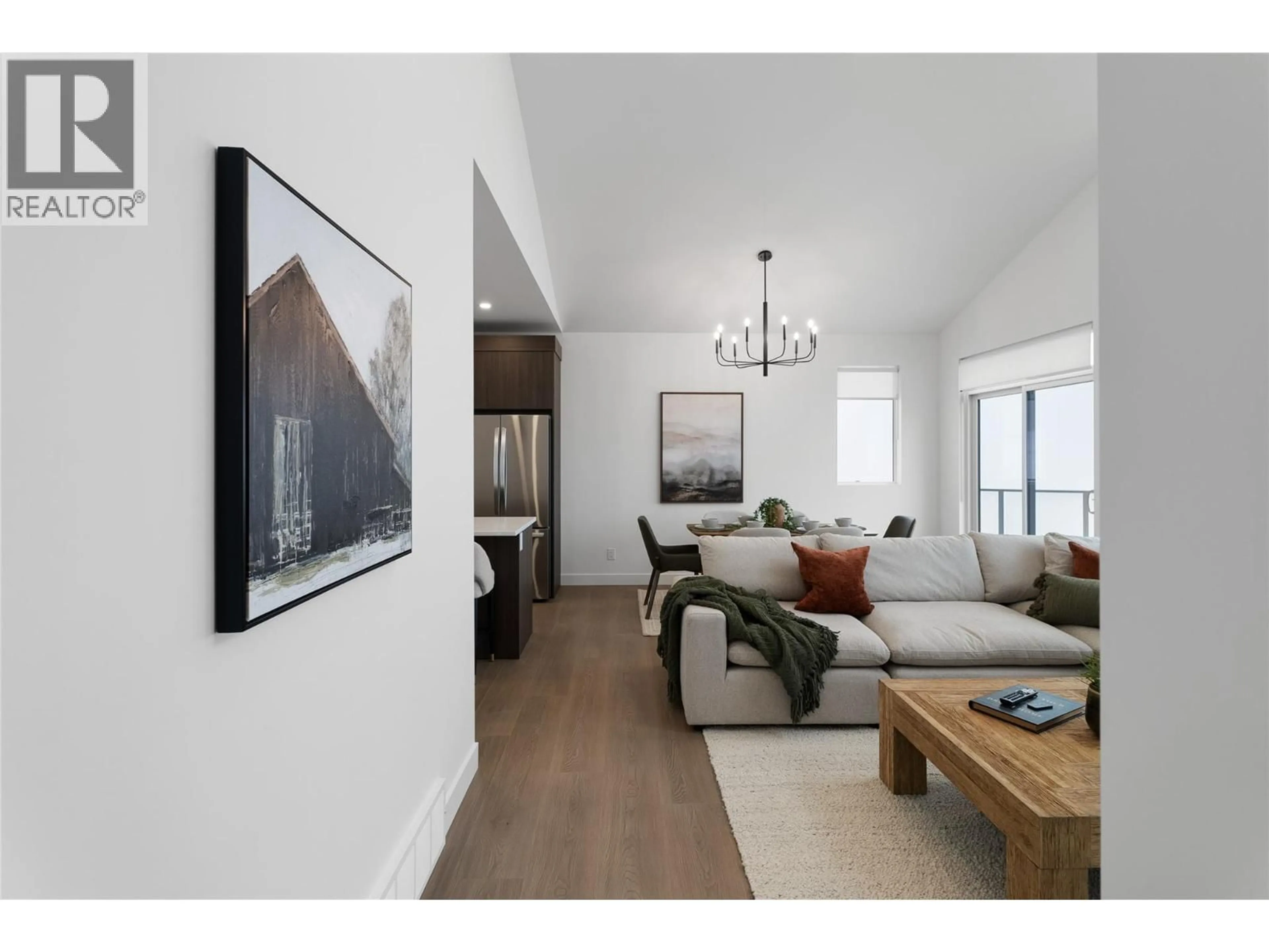 Living room with furniture, wood/laminate floor for 108 - 2400 COLDWATER DRIVE, Kamloops British Columbia V2E0E9