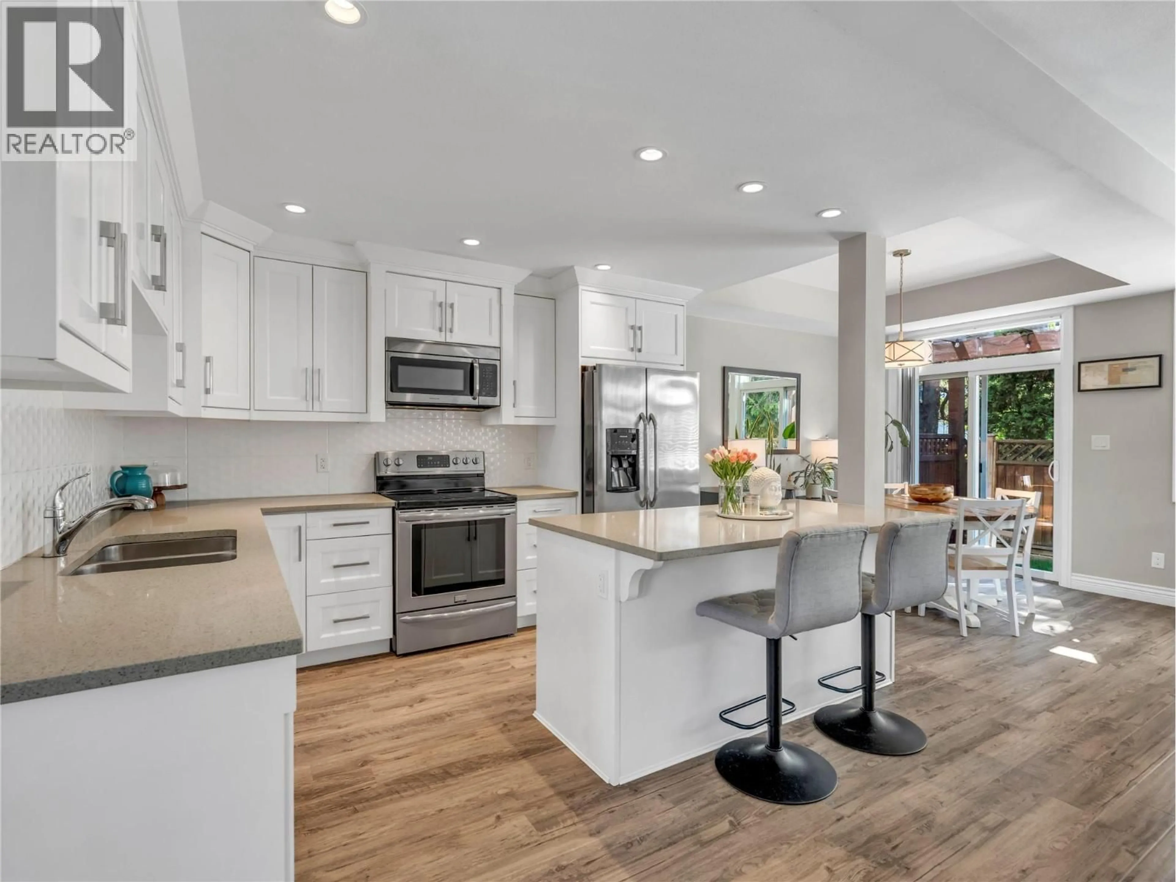 Open concept kitchen, unknown for 103 - 10511 QUINPOOL ROAD, Summerland British Columbia V0H1Z0
