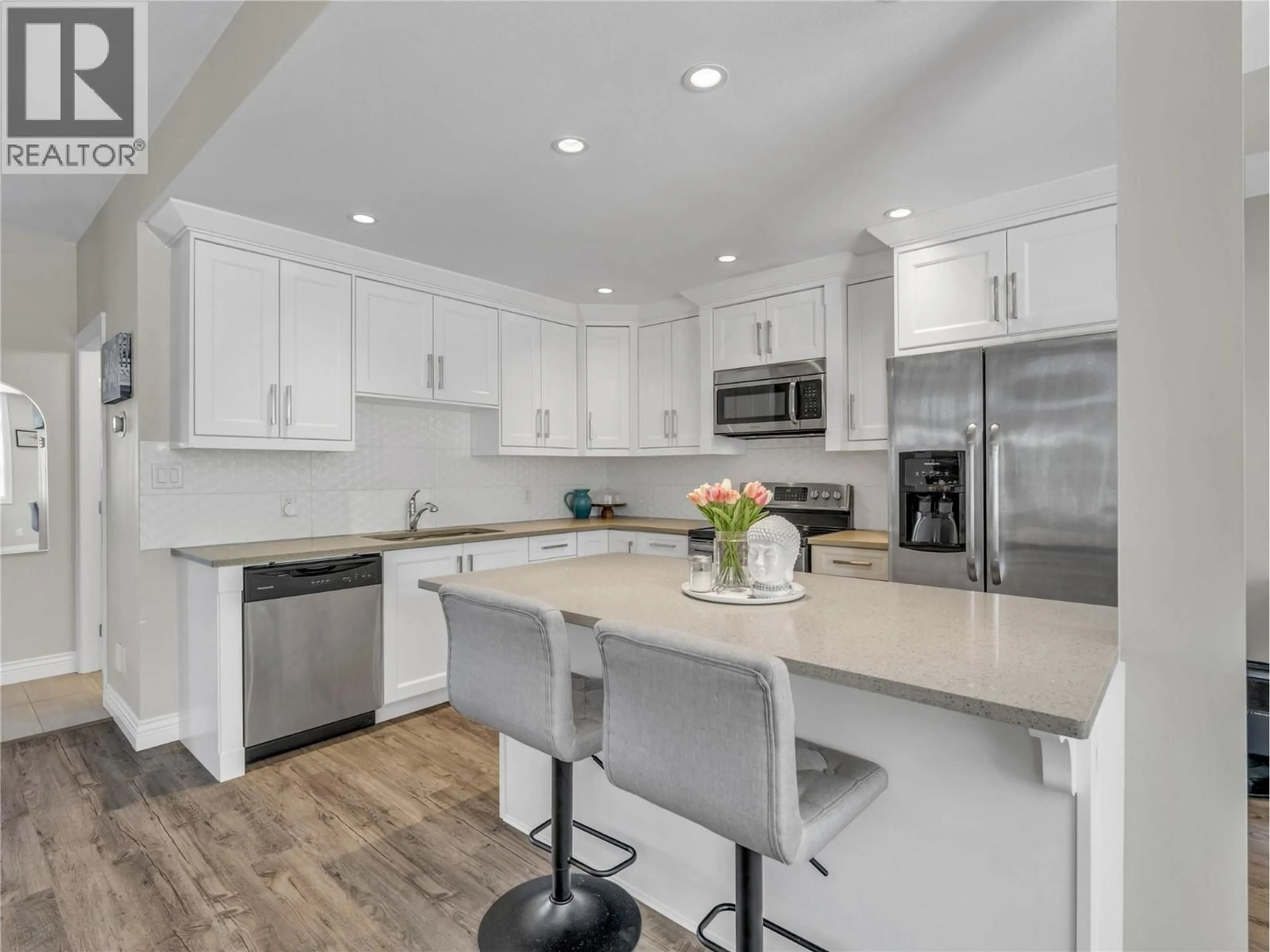 Open concept kitchen, ceramic/tile floor for 103 - 10511 QUINPOOL ROAD, Summerland British Columbia V0H1Z0