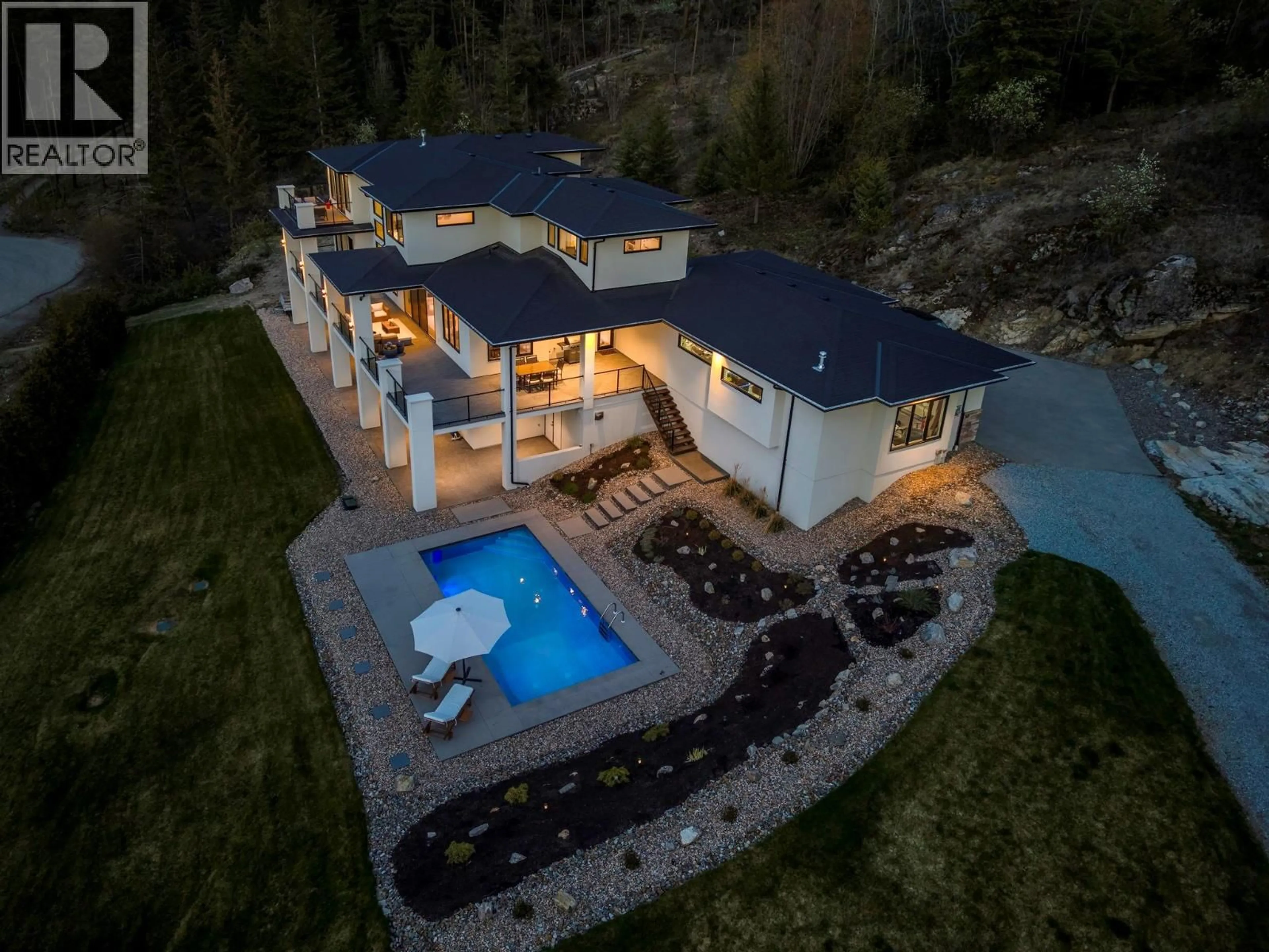 A pic from outside/outdoor area/front of a property/back of a property/a pic from drone, mountain view for 4451 HAYES ROAD, Kelowna British Columbia V1W5A7