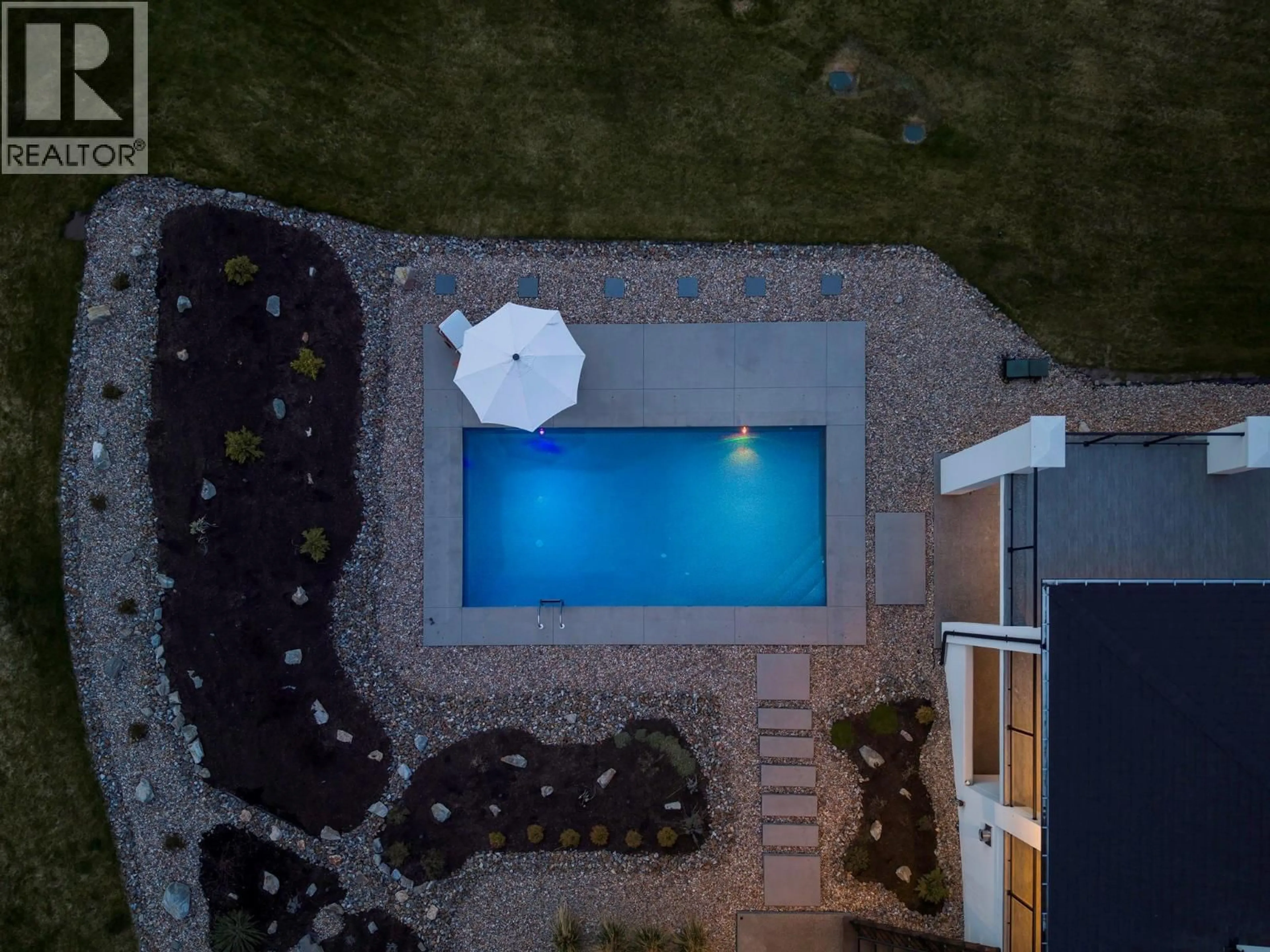 A pic from outside/outdoor area/front of a property/back of a property/a pic from drone, street for 4451 HAYES ROAD, Kelowna British Columbia V1W5A7