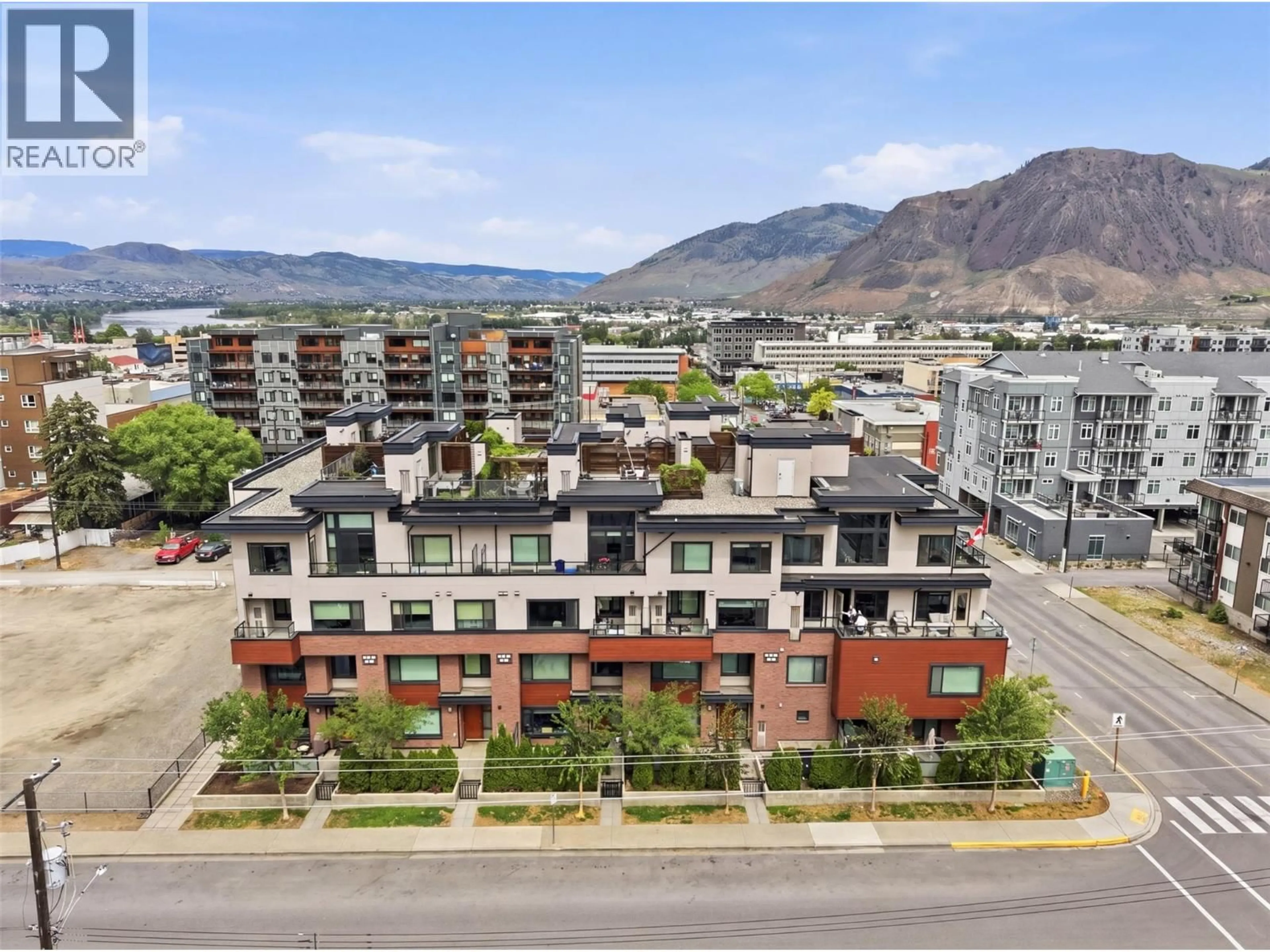 A pic from outside/outdoor area/front of a property/back of a property/a pic from drone, mountain view for 303 - 460 5TH AVENUE, Kamloops British Columbia V2C5Y2
