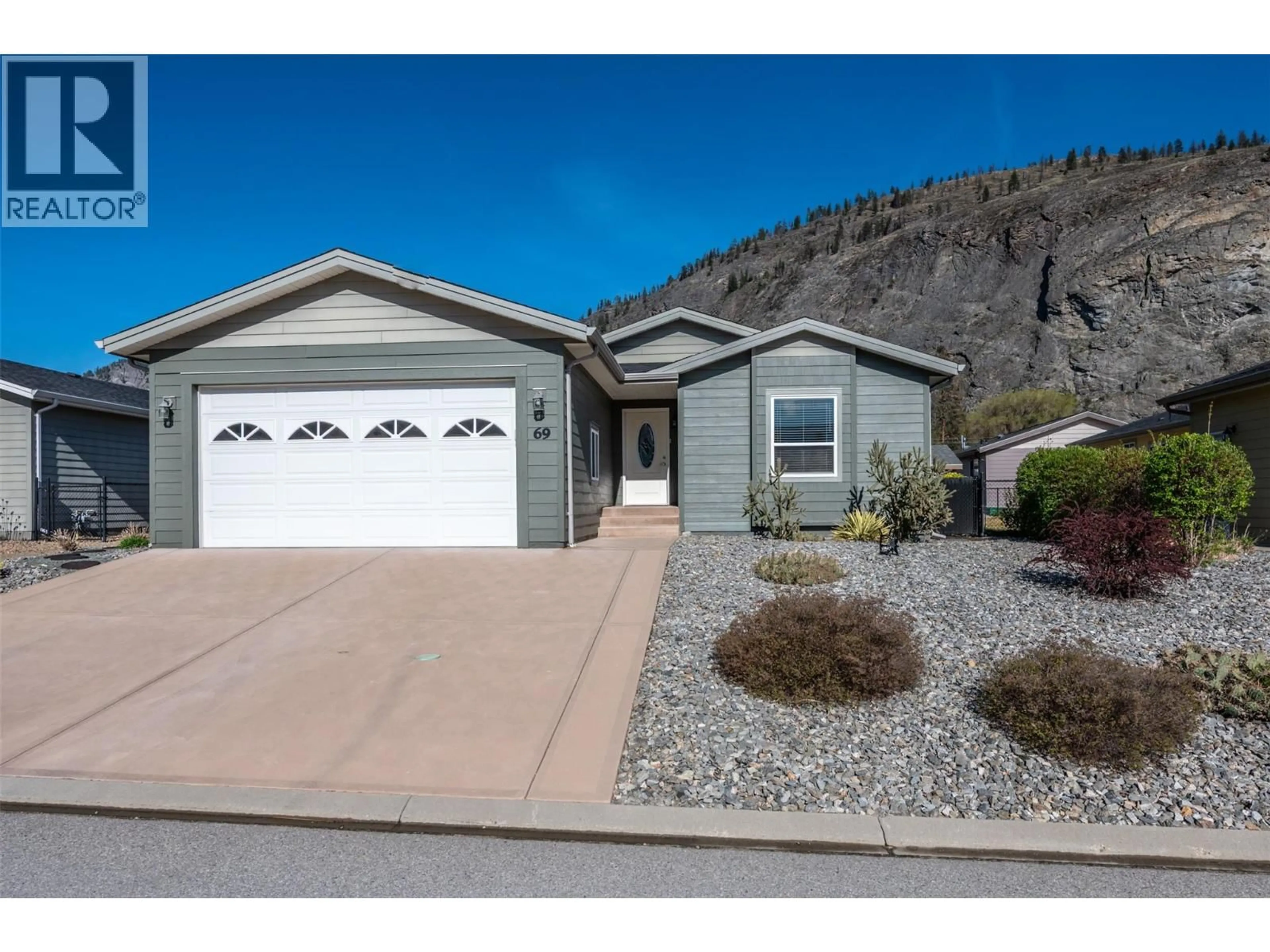 Home with vinyl exterior material, street for 69 - 8300 GALLAGHER LAKE FRONTAGE ROAD, Oliver British Columbia V0H1T2