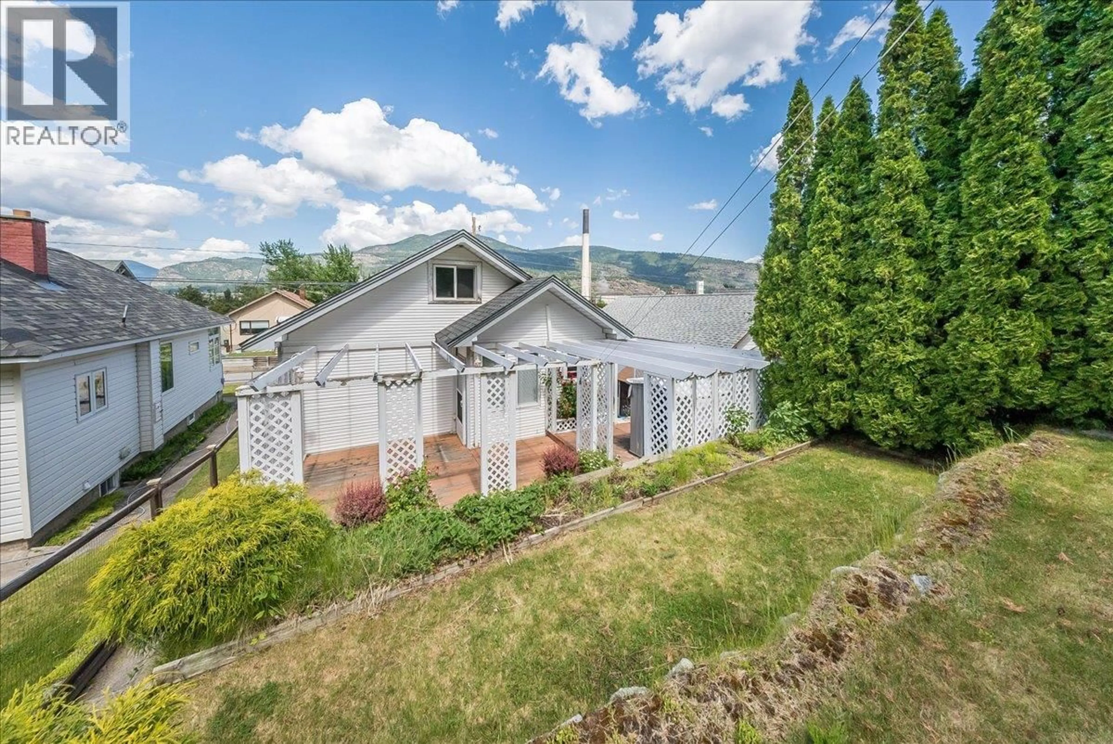 A pic from outside/outdoor area/front of a property/back of a property/a pic from drone, mountain view for 426 AUSTAD LANE, Trail British Columbia V1R3K6