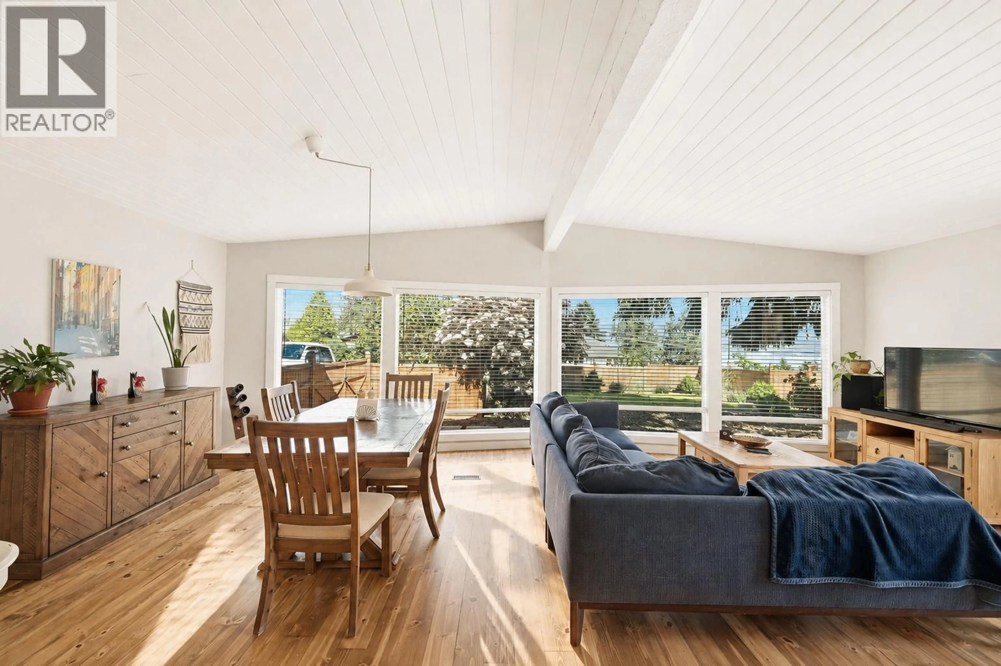 Living room with furniture, wood/laminate floor for 2853 LOWER GLENROSA ROAD, West Kelowna British Columbia V4T1V7