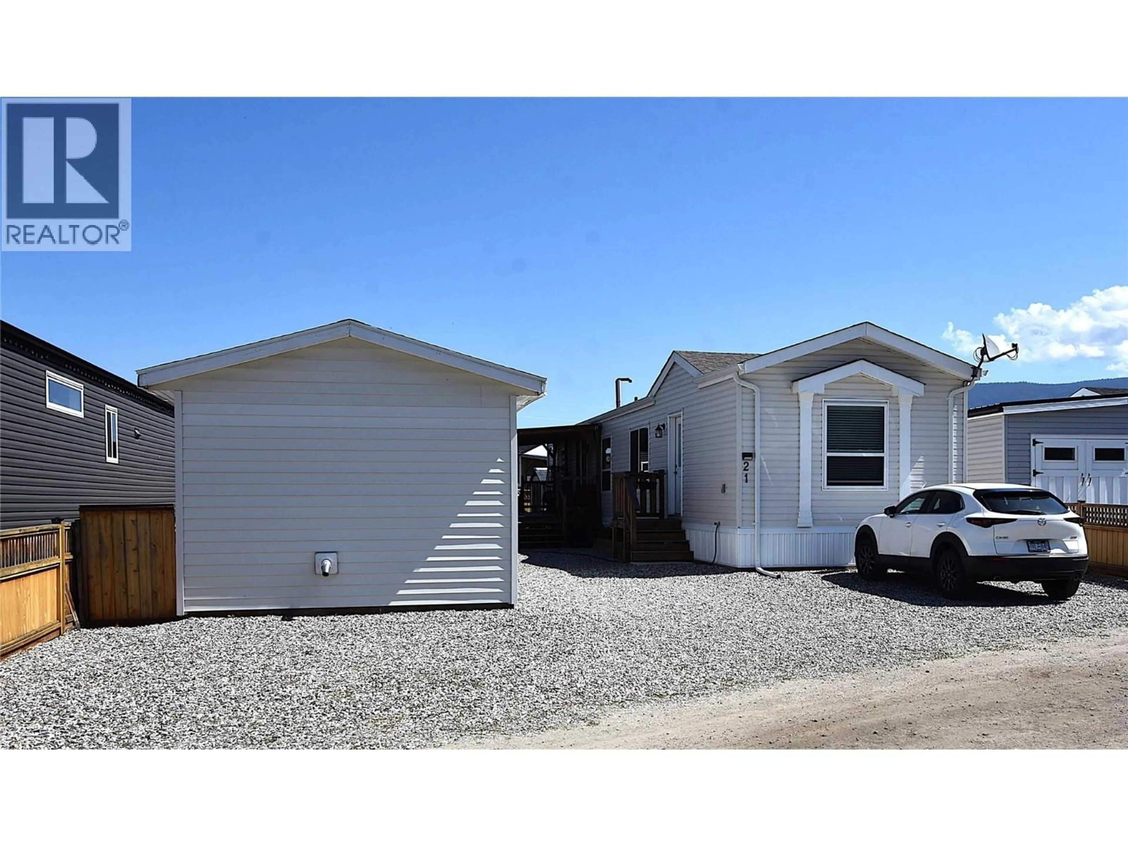 Home with vinyl exterior material, street for 21 - 65 ANTOINE ROAD, Vernon British Columbia V1H2A3