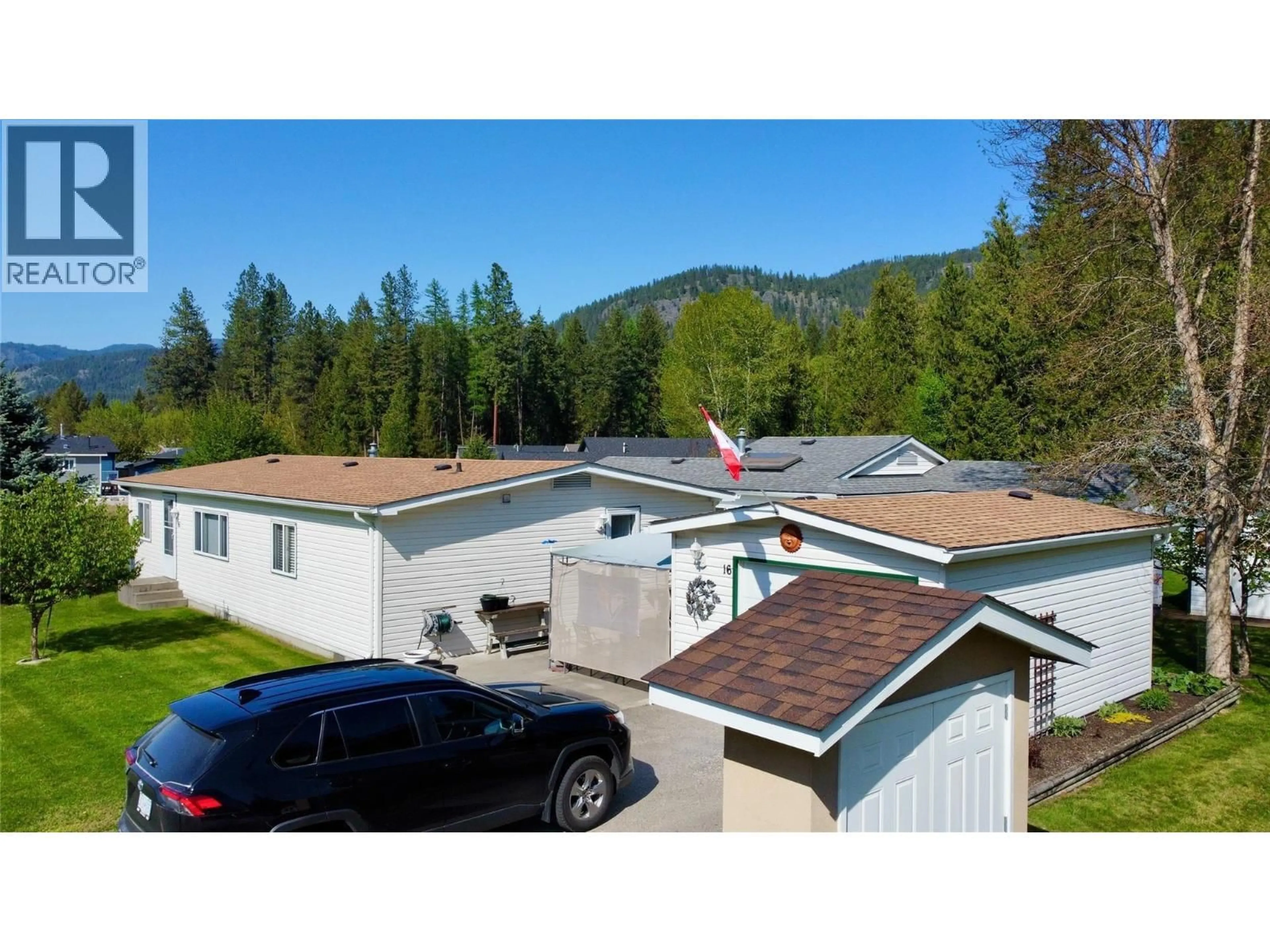 A pic from outside/outdoor area/front of a property/back of a property/a pic from drone, mountain view for 16 - 1500 NEIMI ROAD, Christina Lake British Columbia V0H1E2