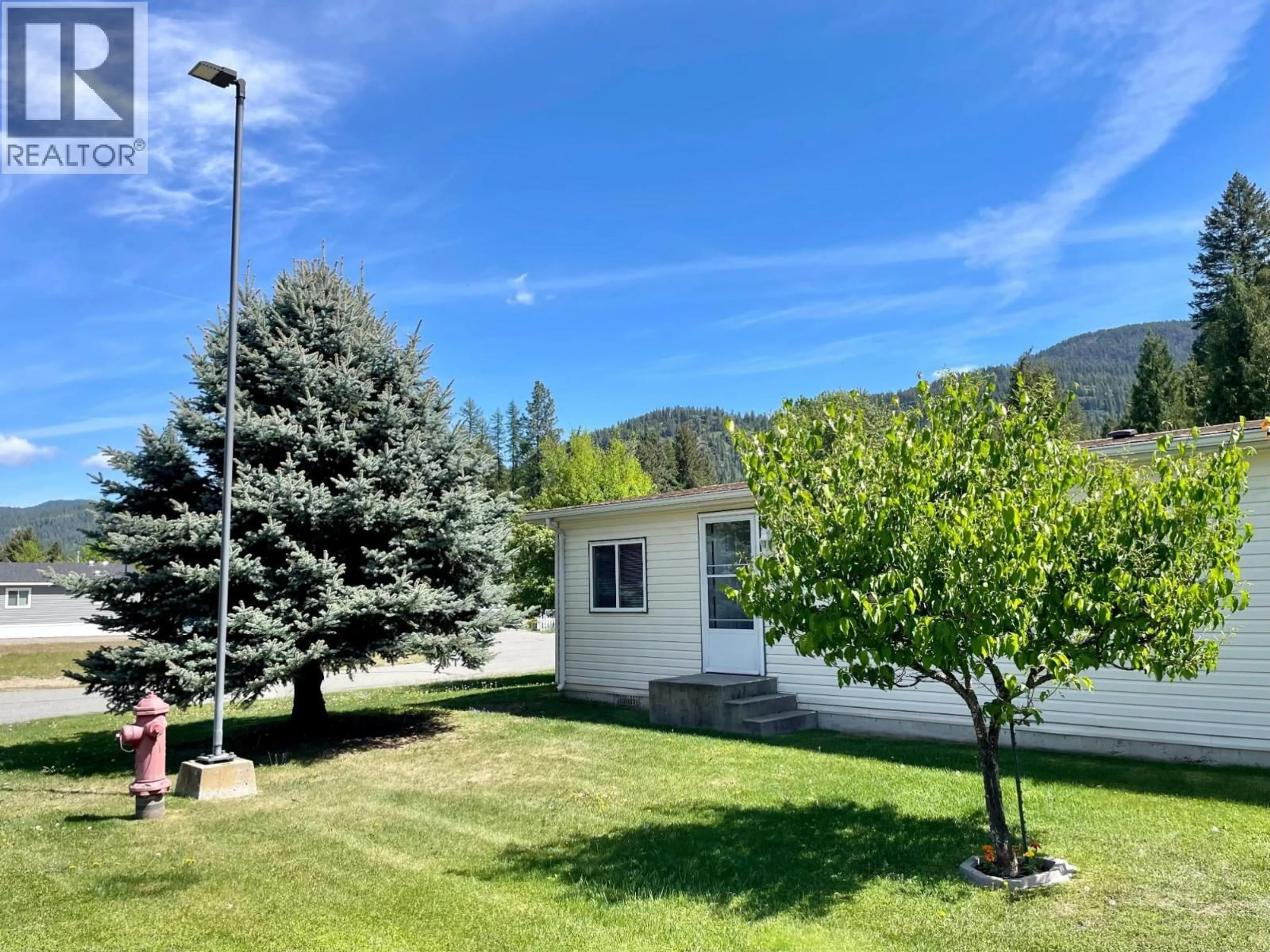 A pic from outside/outdoor area/front of a property/back of a property/a pic from drone, mountain view for 16 - 1500 NEIMI ROAD, Christina Lake British Columbia V0H1E2