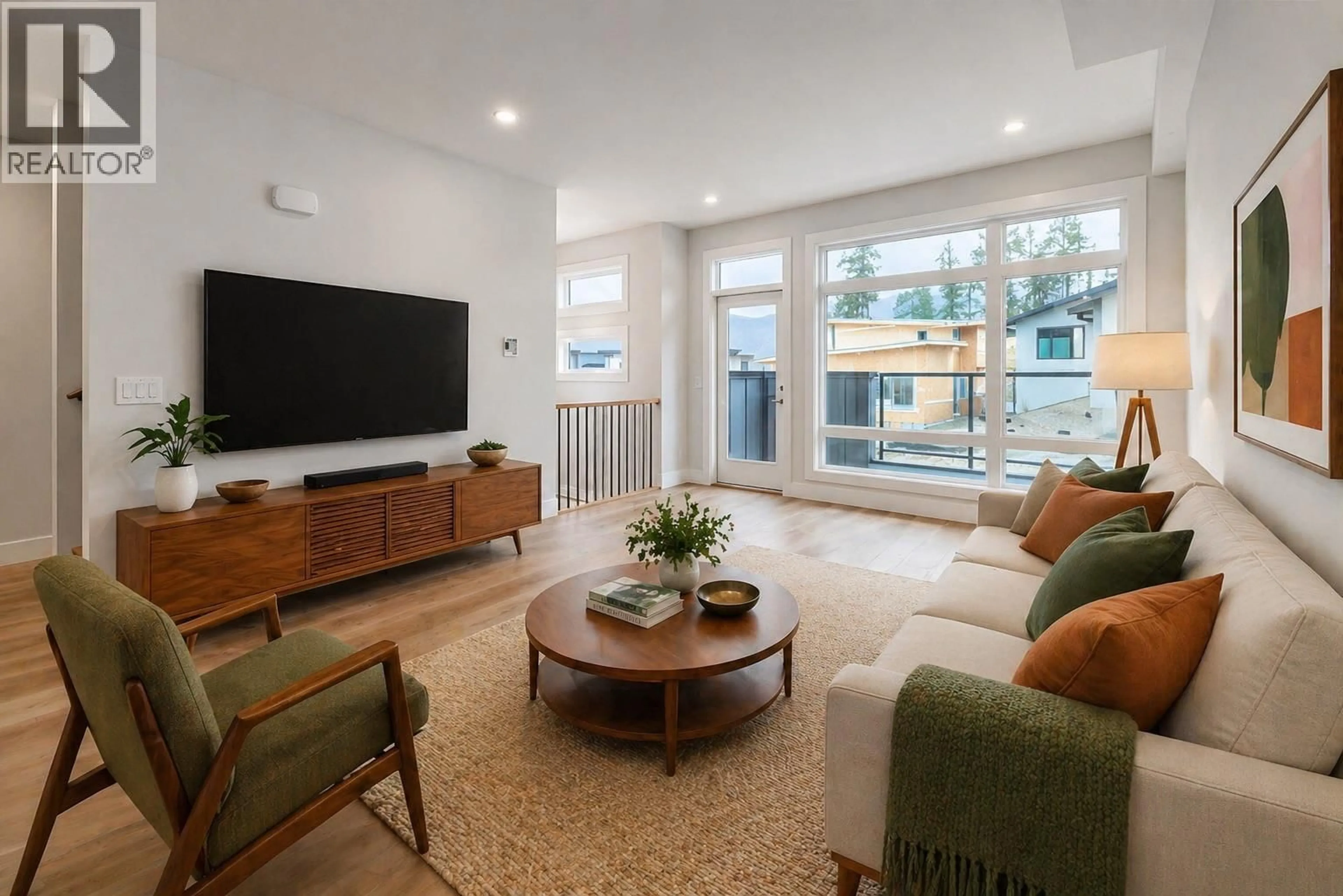 Living room with furniture, unknown for 5 - 3425 HILLTOWN DRIVE, Kelowna British Columbia V1V2B5