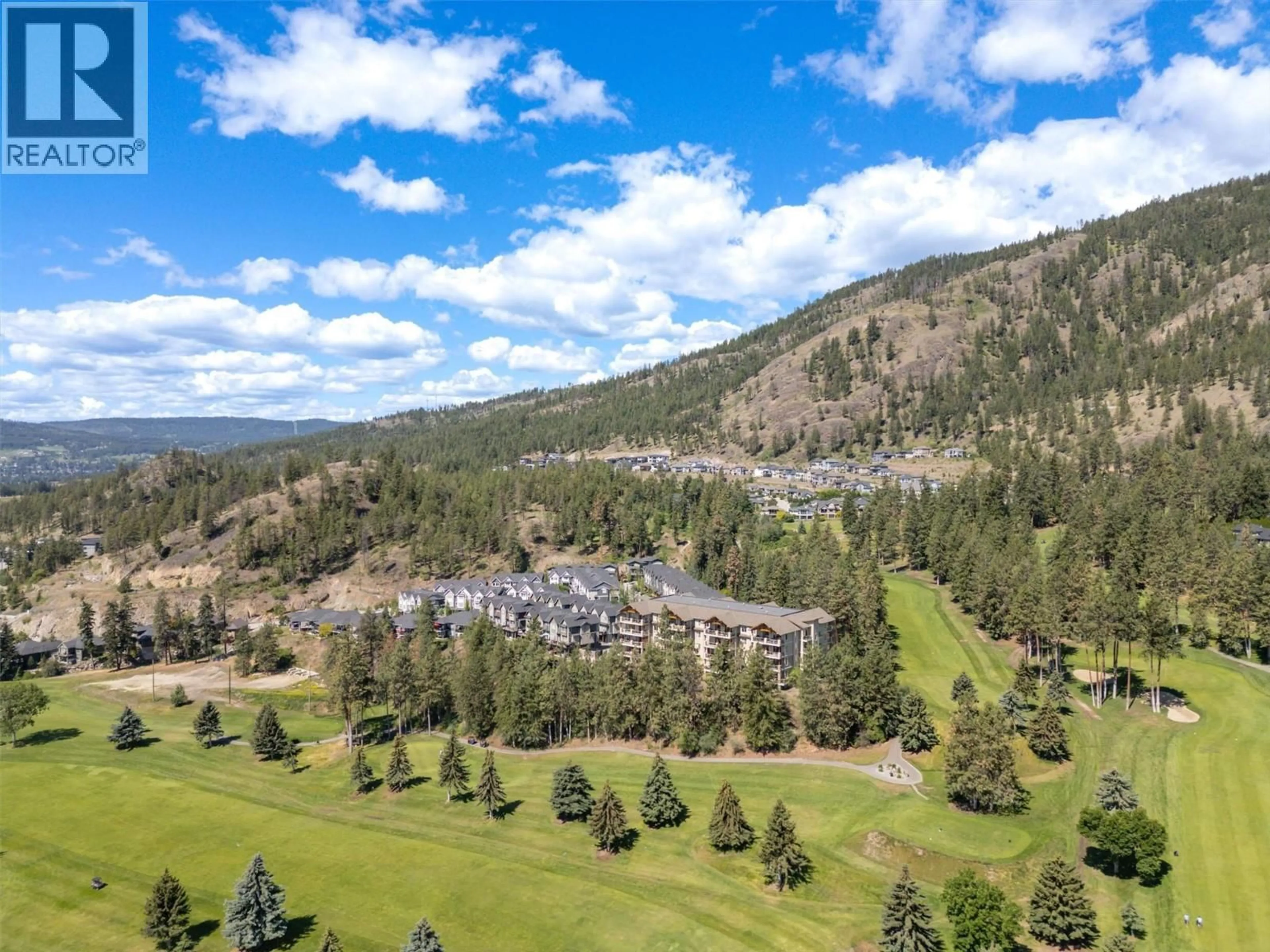 A pic from outside/outdoor area/front of a property/back of a property/a pic from drone, mountain view for 405 - 2470 TUSCANY DRIVE, West Kelowna British Columbia V4T3G8