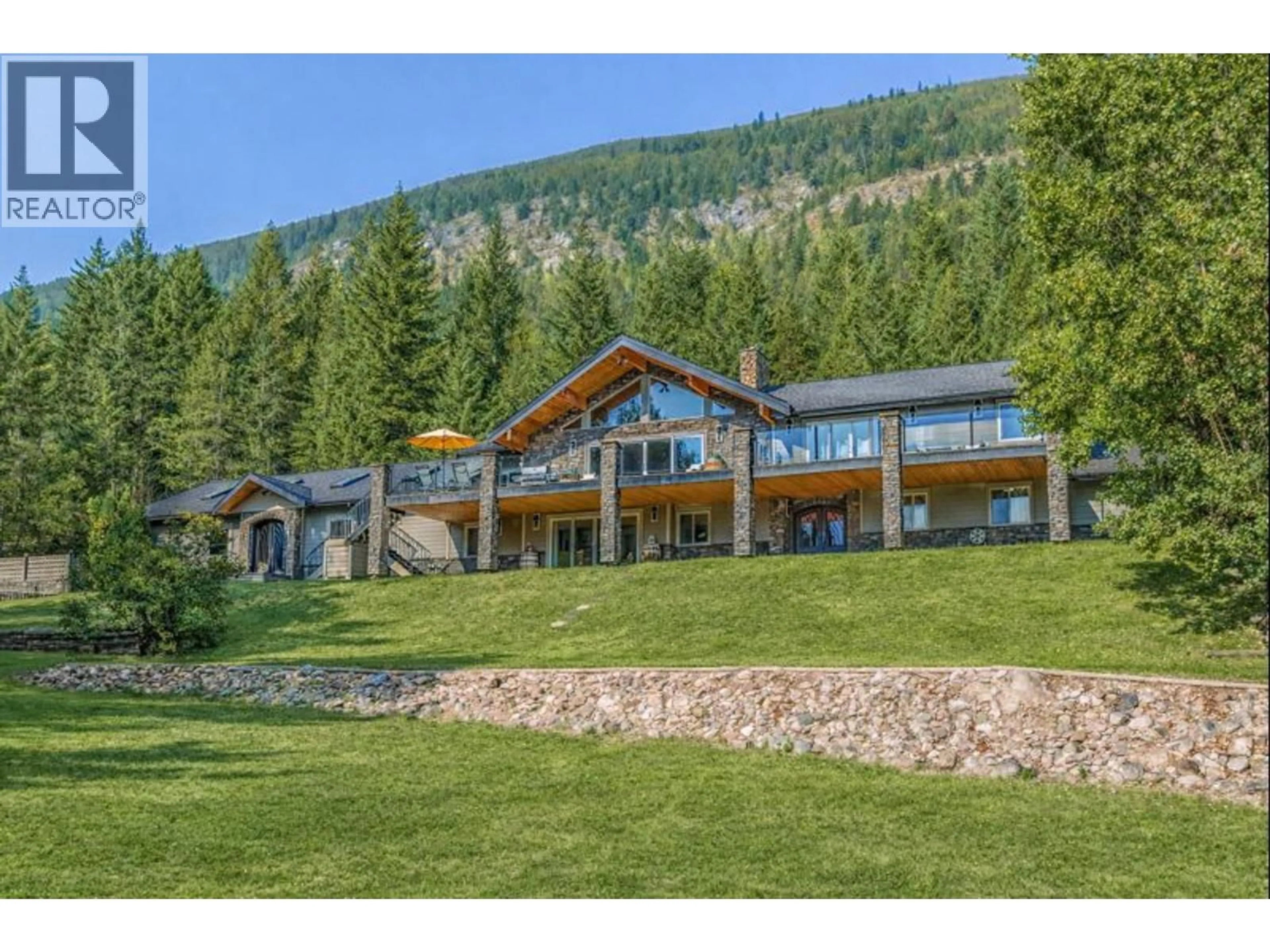 A pic from outside/outdoor area/front of a property/back of a property/a pic from drone, mountain view for 6171 50 STREET NORTHWEST, Salmon Arm British Columbia V1E3A6