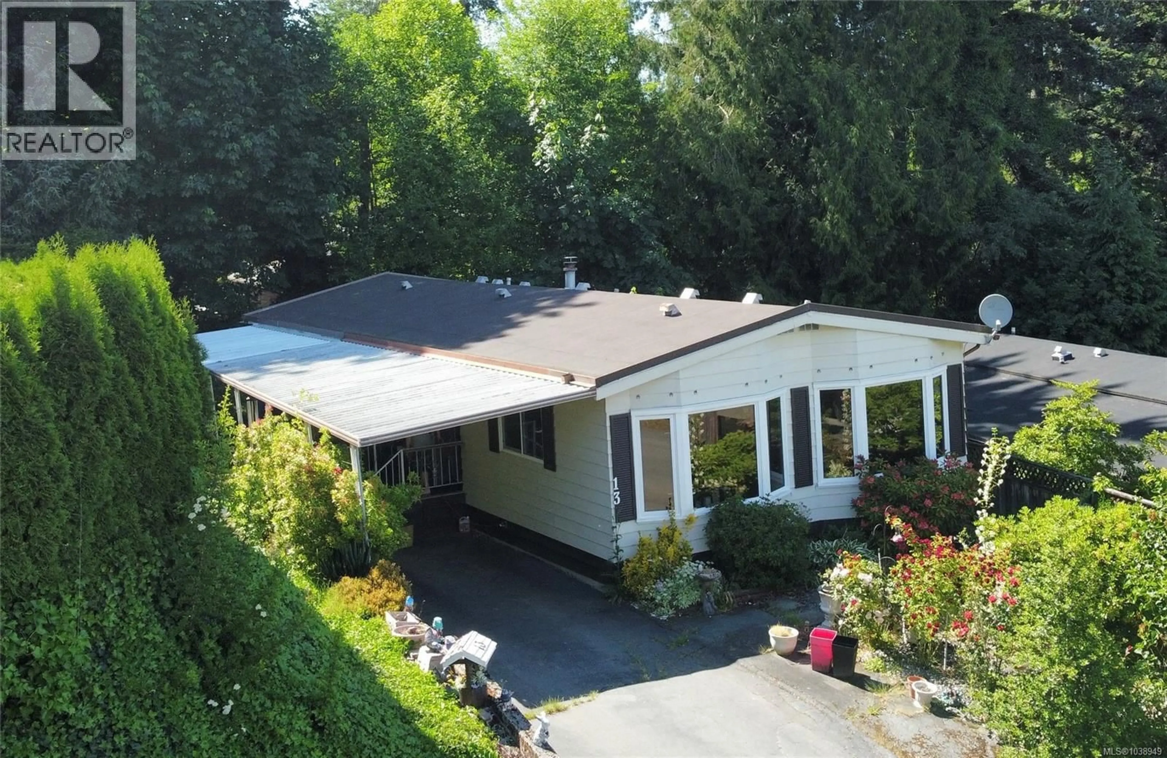 A pic from outside/outdoor area/front of a property/back of a property/a pic from drone, street for 13 - 5150 CHRISTIE ROAD, Ladysmith British Columbia V9G1J2