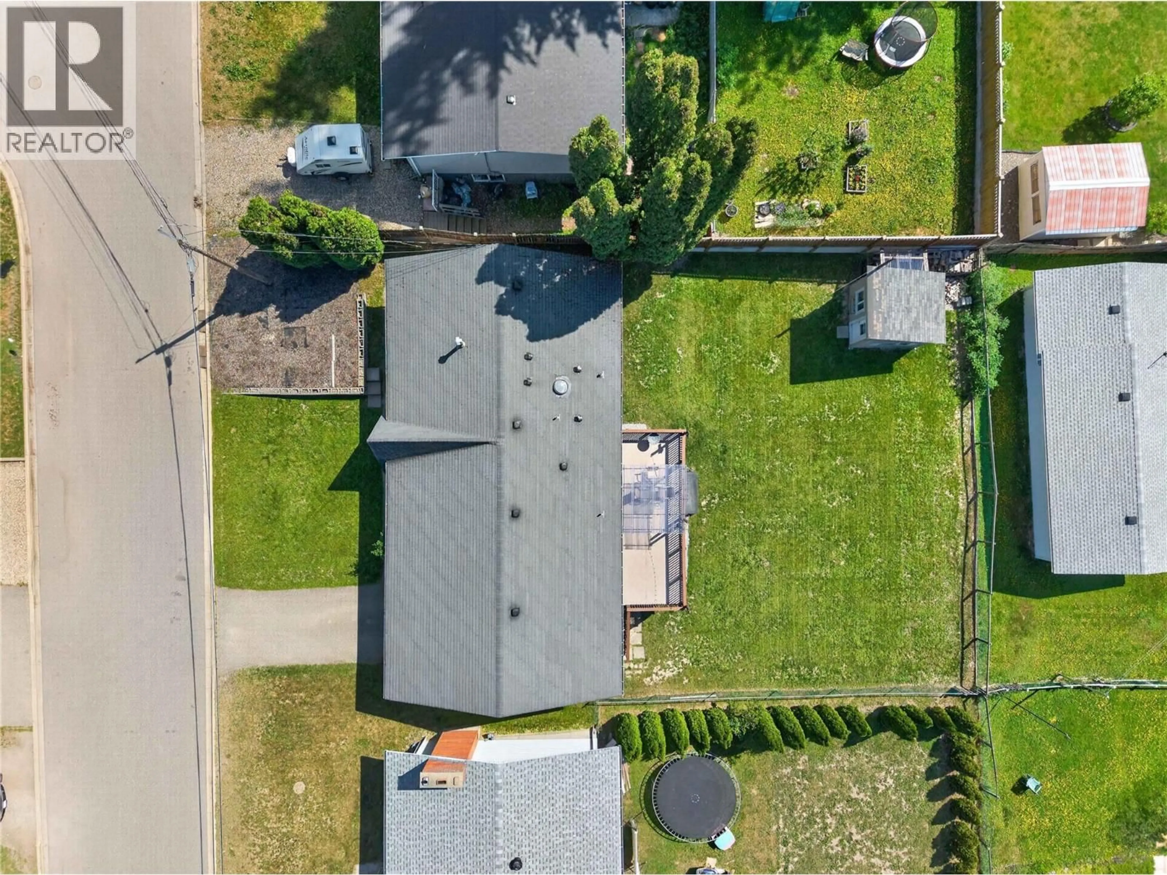 A pic from outside/outdoor area/front of a property/back of a property/a pic from drone, street for 691 3 STREET, Salmon Arm British Columbia V1E4G9