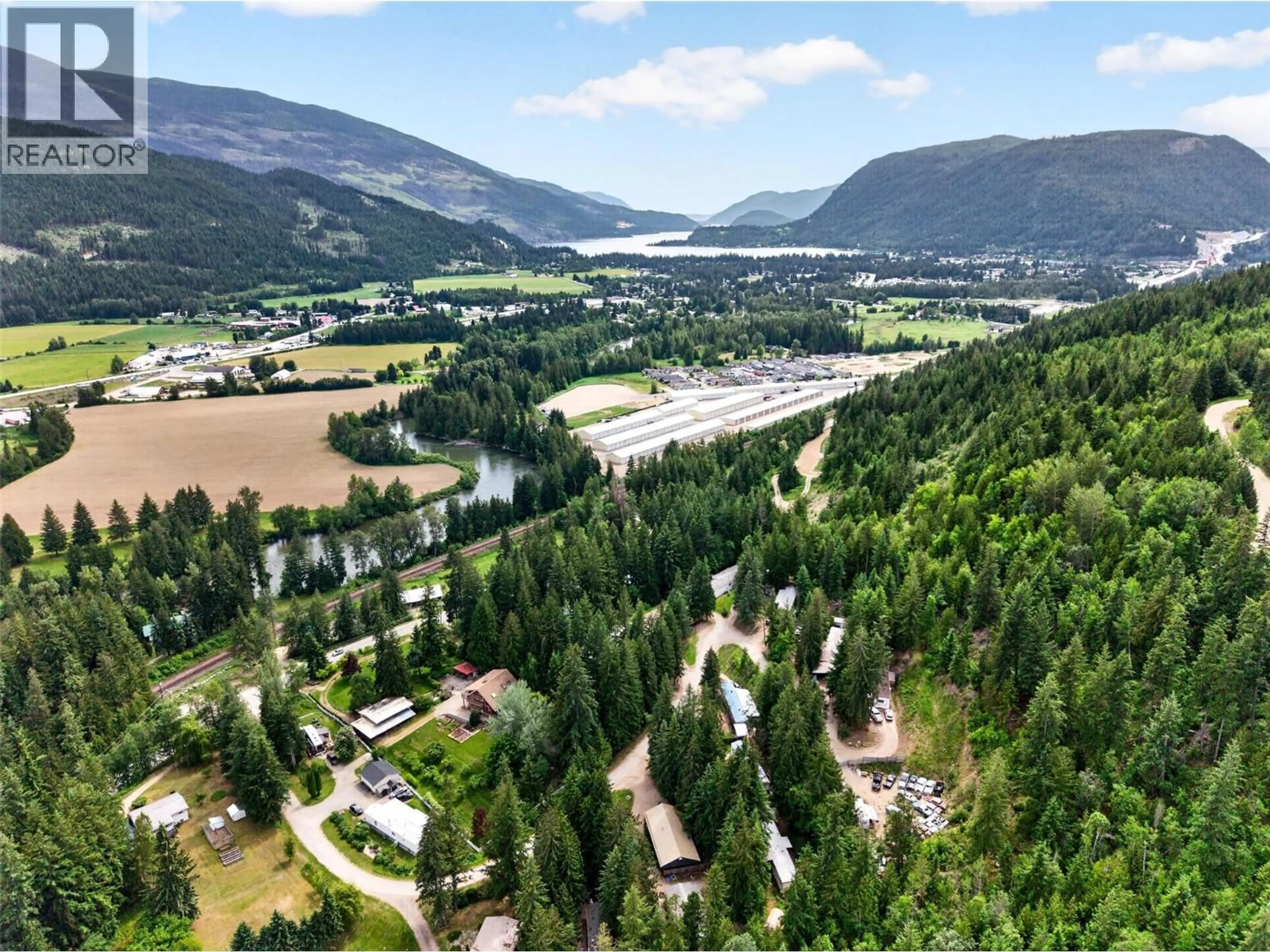 A pic from outside/outdoor area/front of a property/back of a property/a pic from drone, mountain view for 2030 SOLSQUA-SICAMOUS ROAD, Sicamous British Columbia V0E2V4