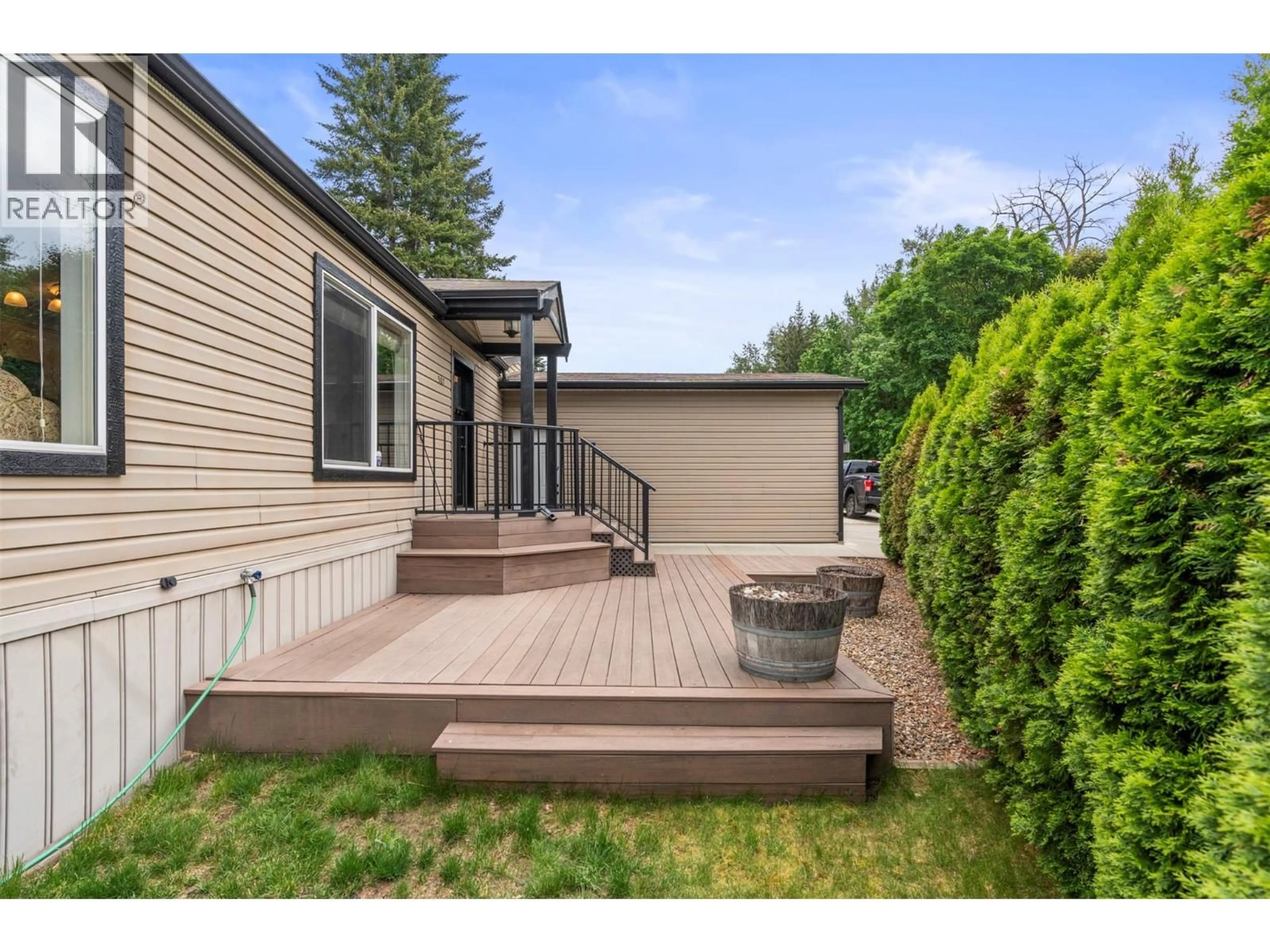 Home with vinyl exterior material, street for 507 - 4701 PLEASANT VALLEY ROAD, Vernon British Columbia V1T4M7