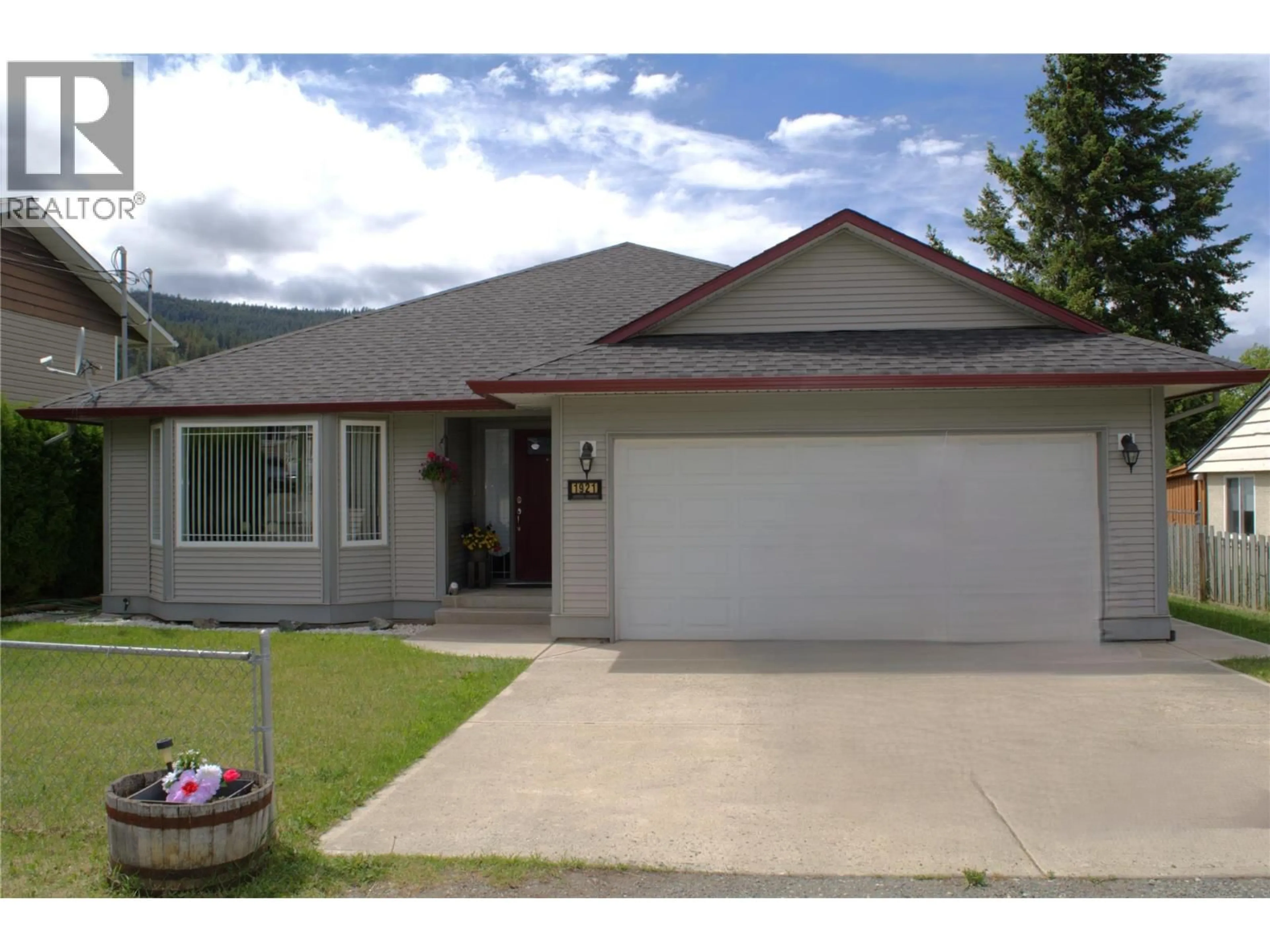 Home with vinyl exterior material, street for 1921 MORRISSEY STREET, Merritt British Columbia V1K1L5