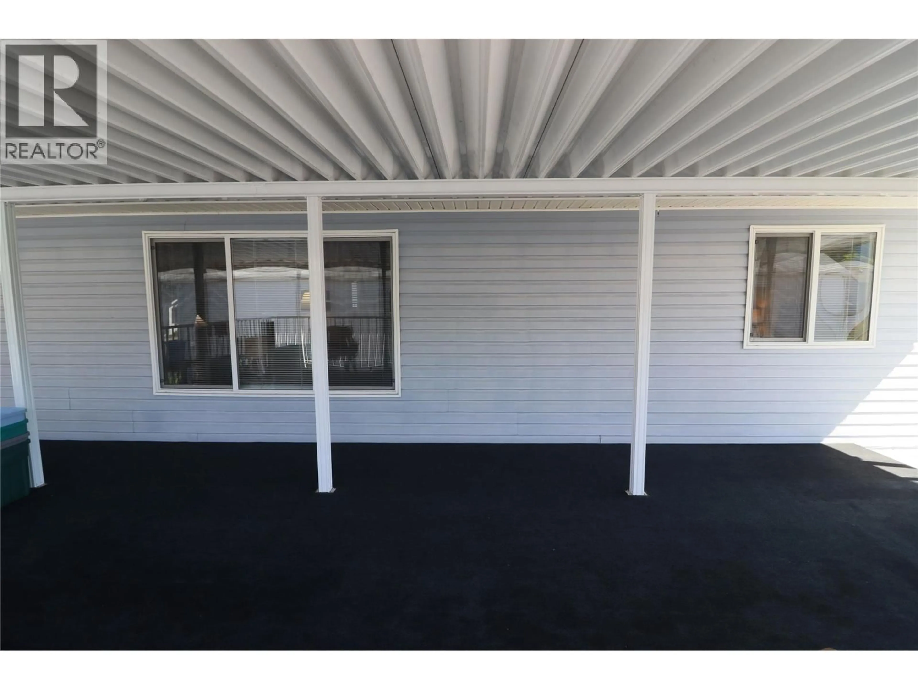 Home with vinyl exterior material, building for 32 - 7225 BOUNDARY DRIVE, Grand Forks British Columbia V0H1H0
