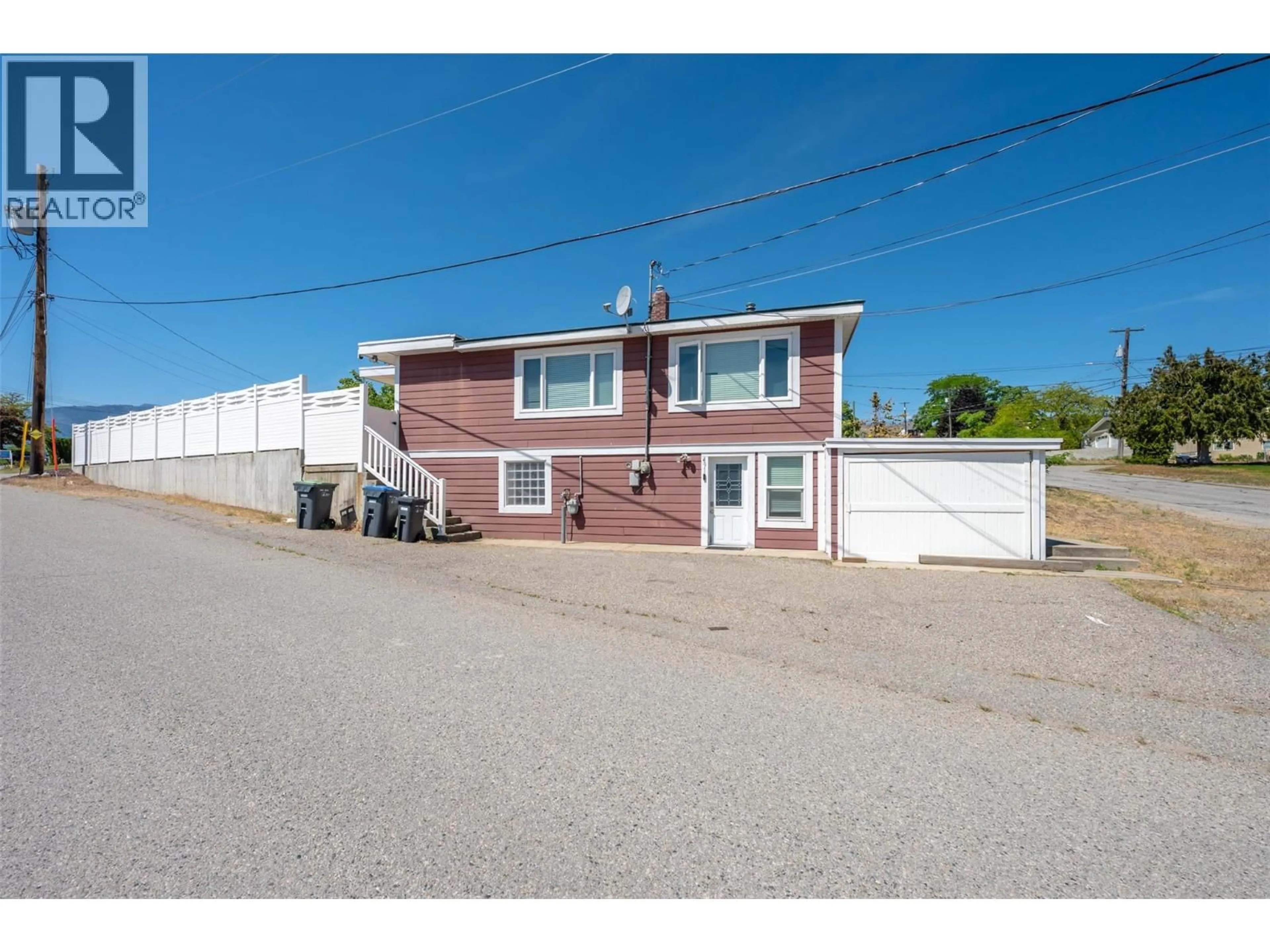 A pic from outside/outdoor area/front of a property/back of a property/a pic from drone, street for 491 EASTSIDE AVENUE, Oliver British Columbia V0H1T4
