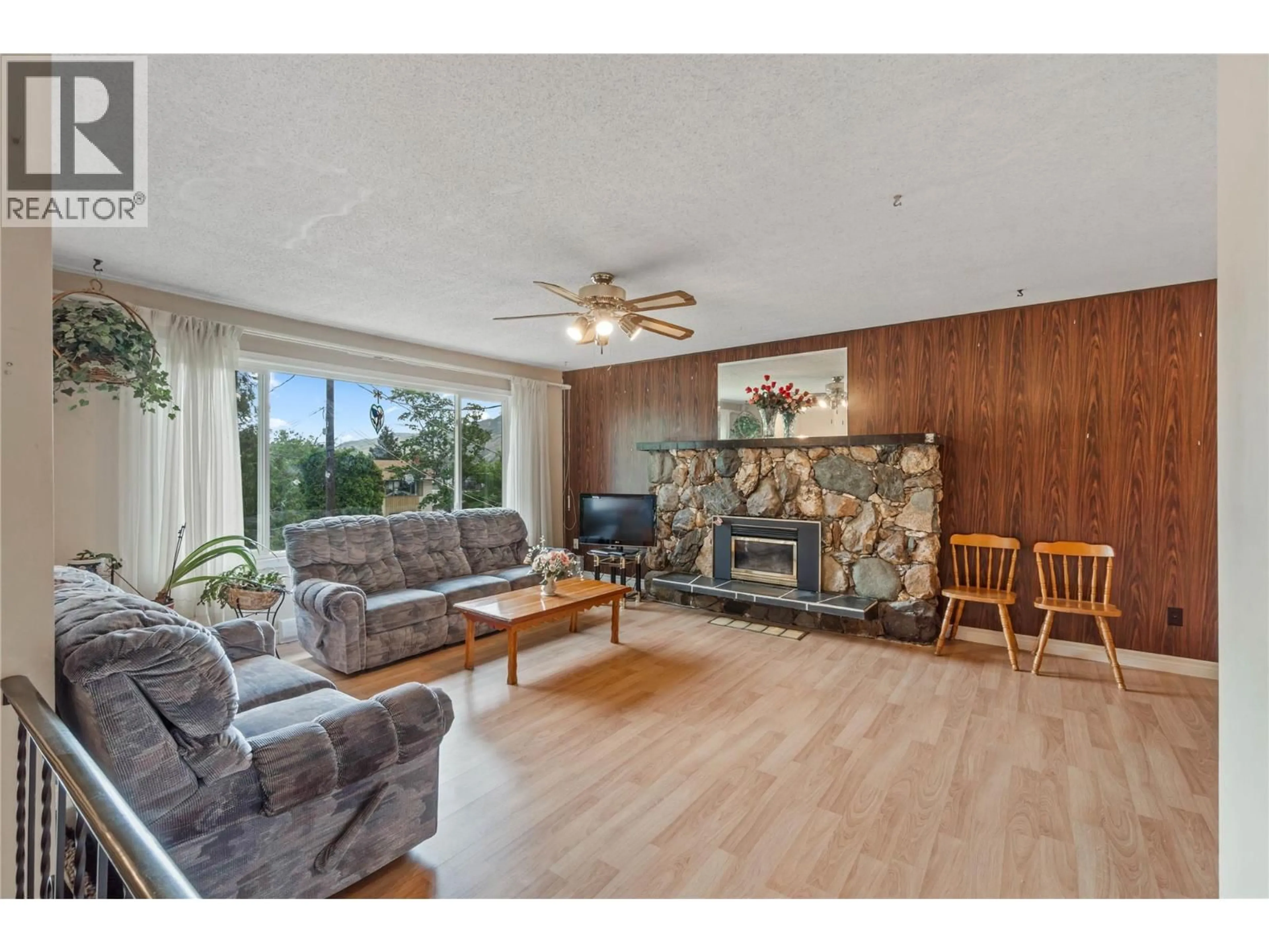 Living room with furniture, wood/laminate floor for 853 ALPINE TERRACE, Kamloops British Columbia V2B6E7