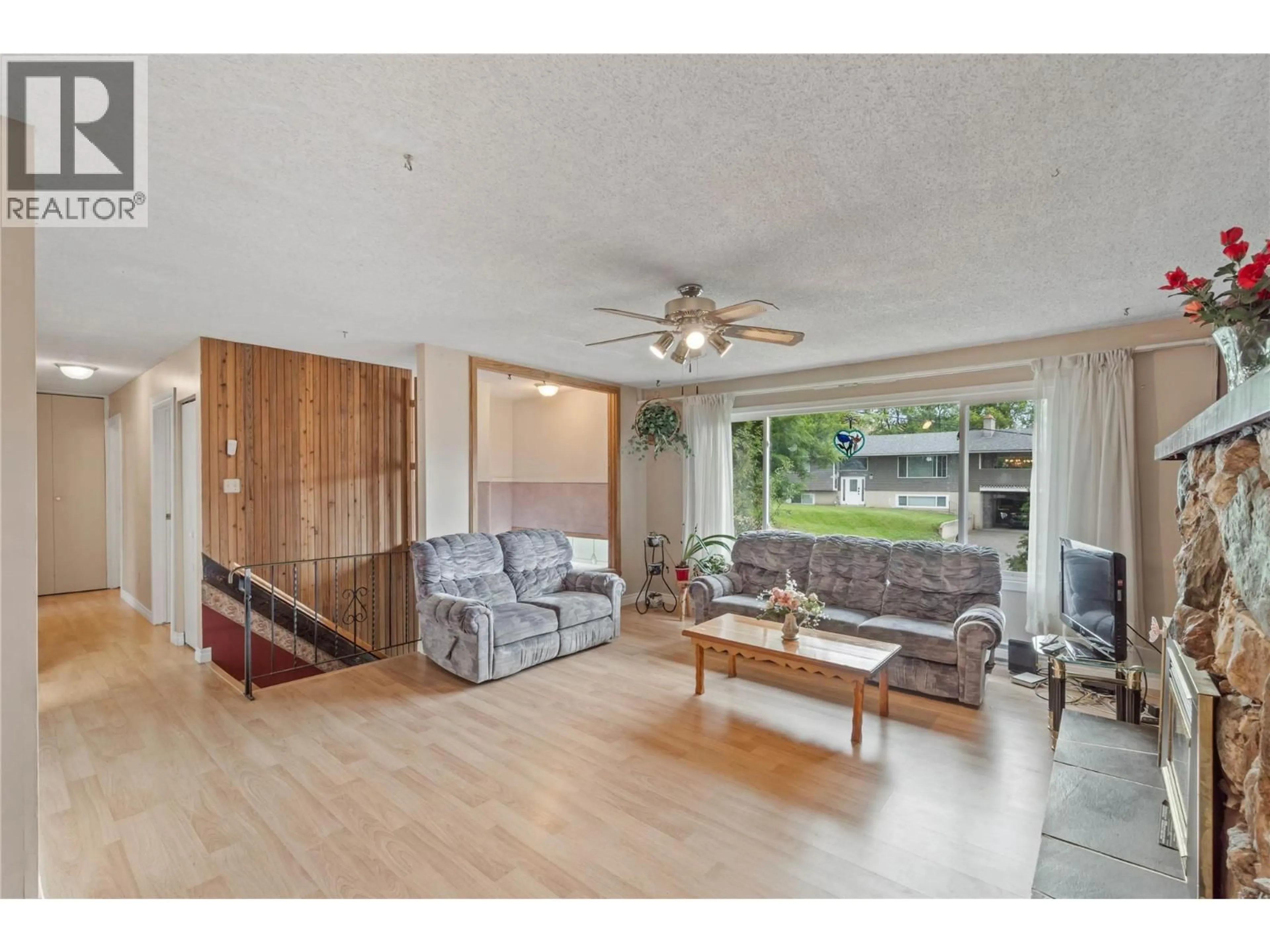 Living room with furniture, wood/laminate floor for 853 ALPINE TERRACE, Kamloops British Columbia V2B6E7