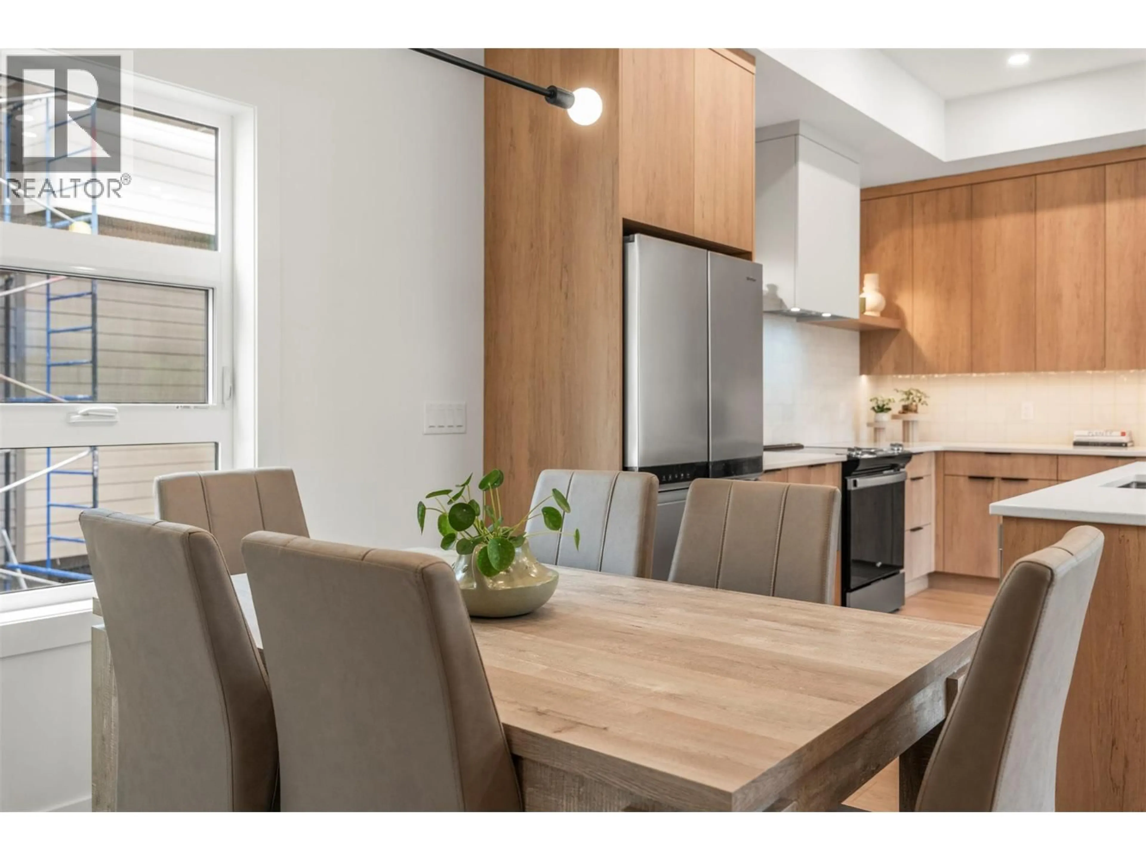 Open concept kitchen, wood/laminate floor for 1 - 4200 30 STREET, Vernon British Columbia V1T5G3