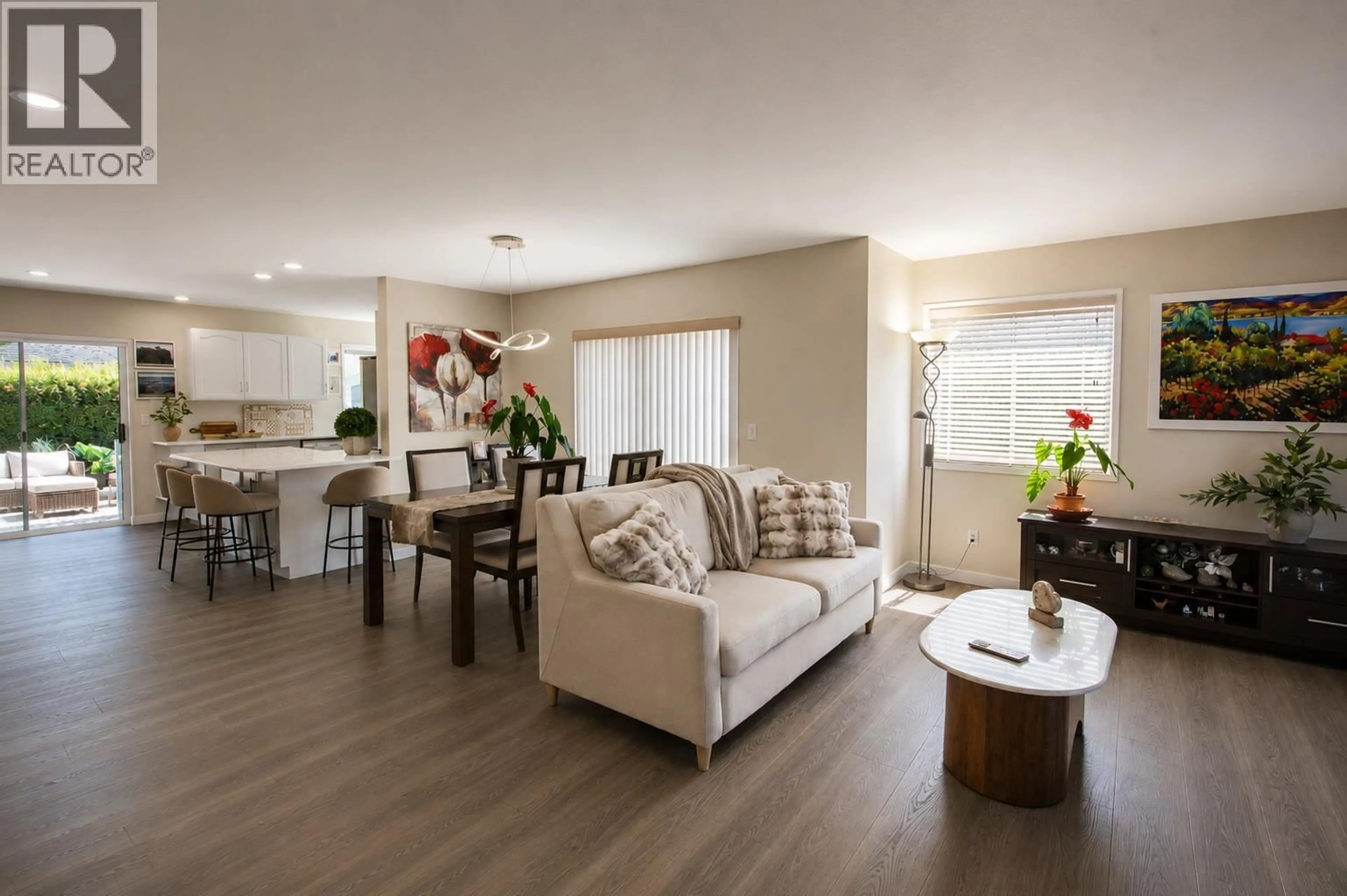 Living room with furniture, wood/laminate floor for 173 - 3400 WILSON STREET, Penticton British Columbia V2A8H9