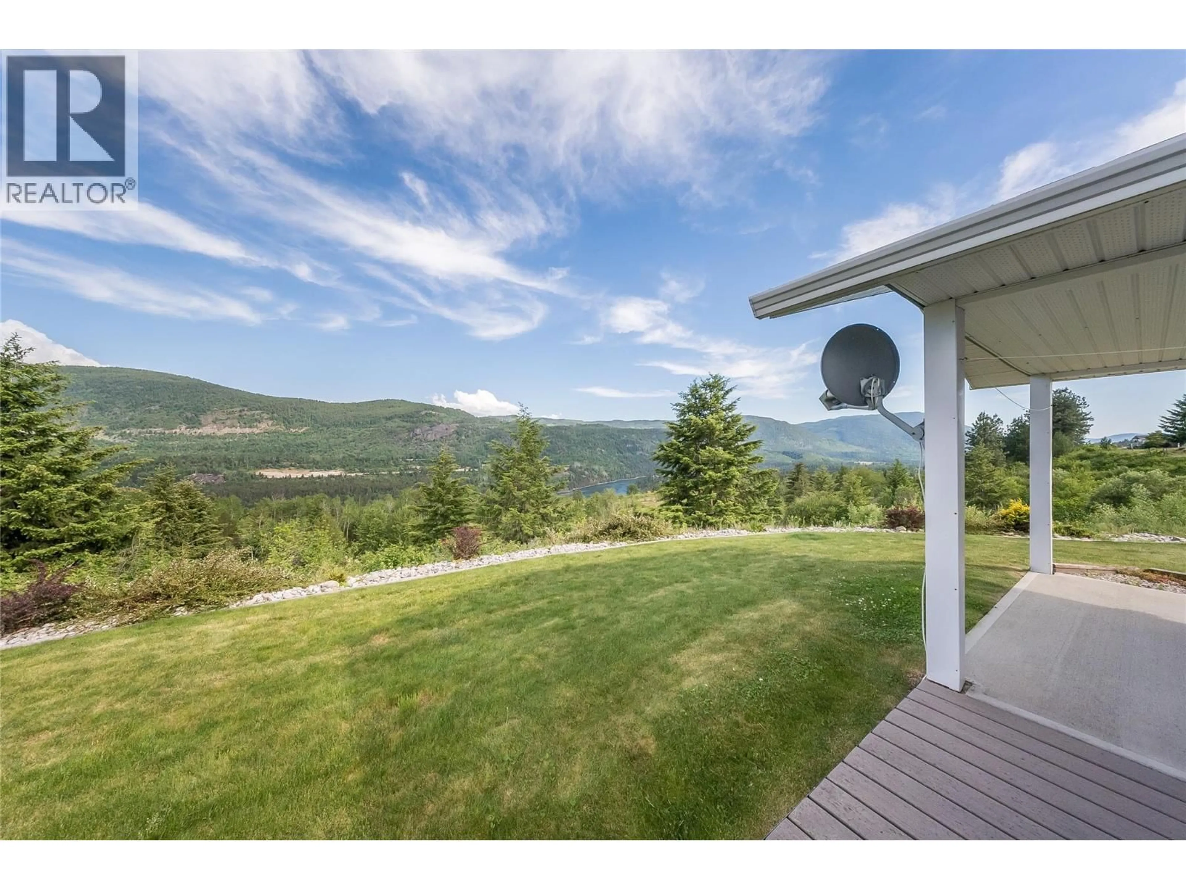 A pic from outside/outdoor area/front of a property/back of a property/a pic from drone, water/lake/river/ocean view for 115 - 4200 GRANDVIEW DRIVE, Castlegar British Columbia V1N4X6