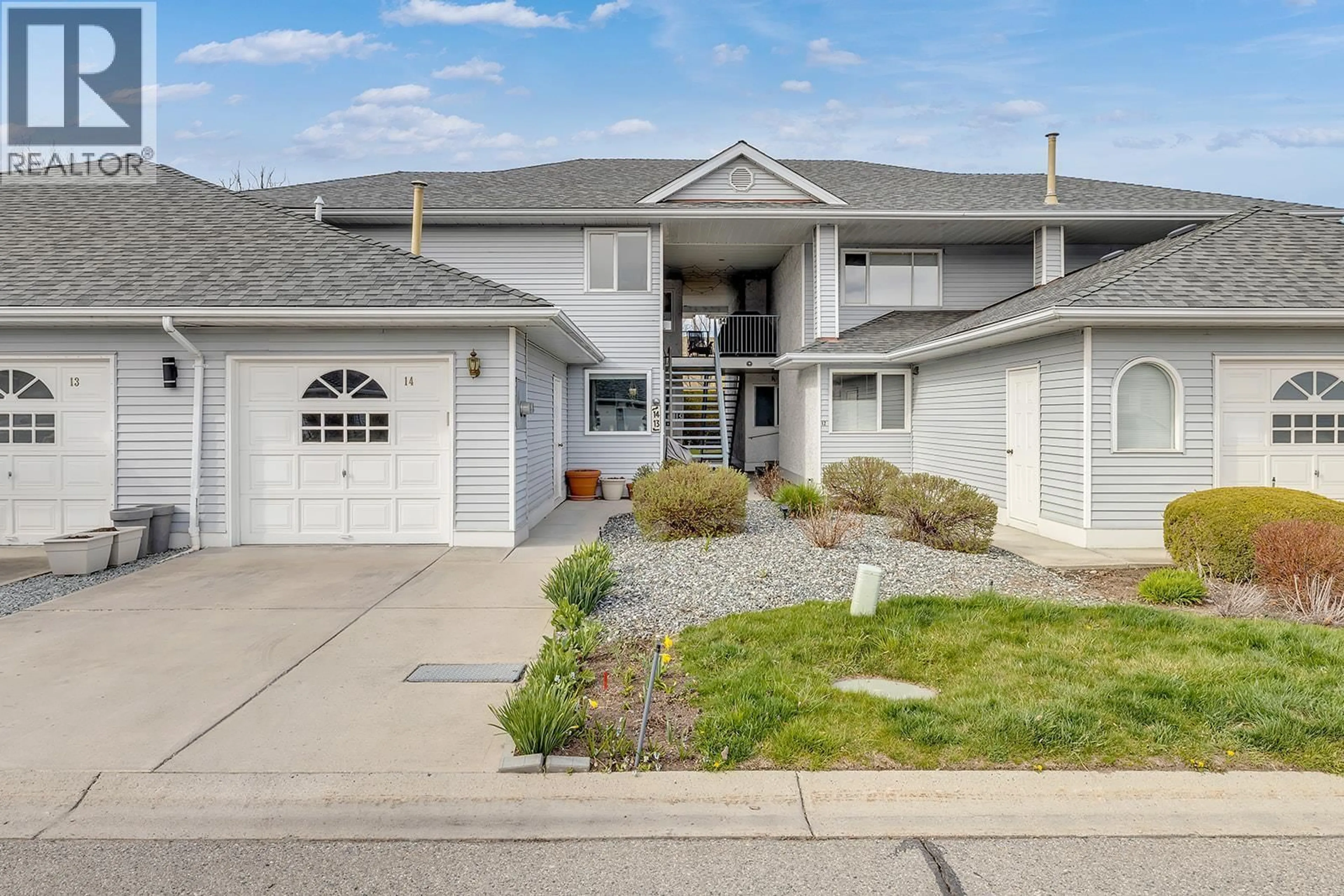 Home with vinyl exterior material, street for 14 - 3370 CASORSO ROAD, Kelowna British Columbia V1W3J2