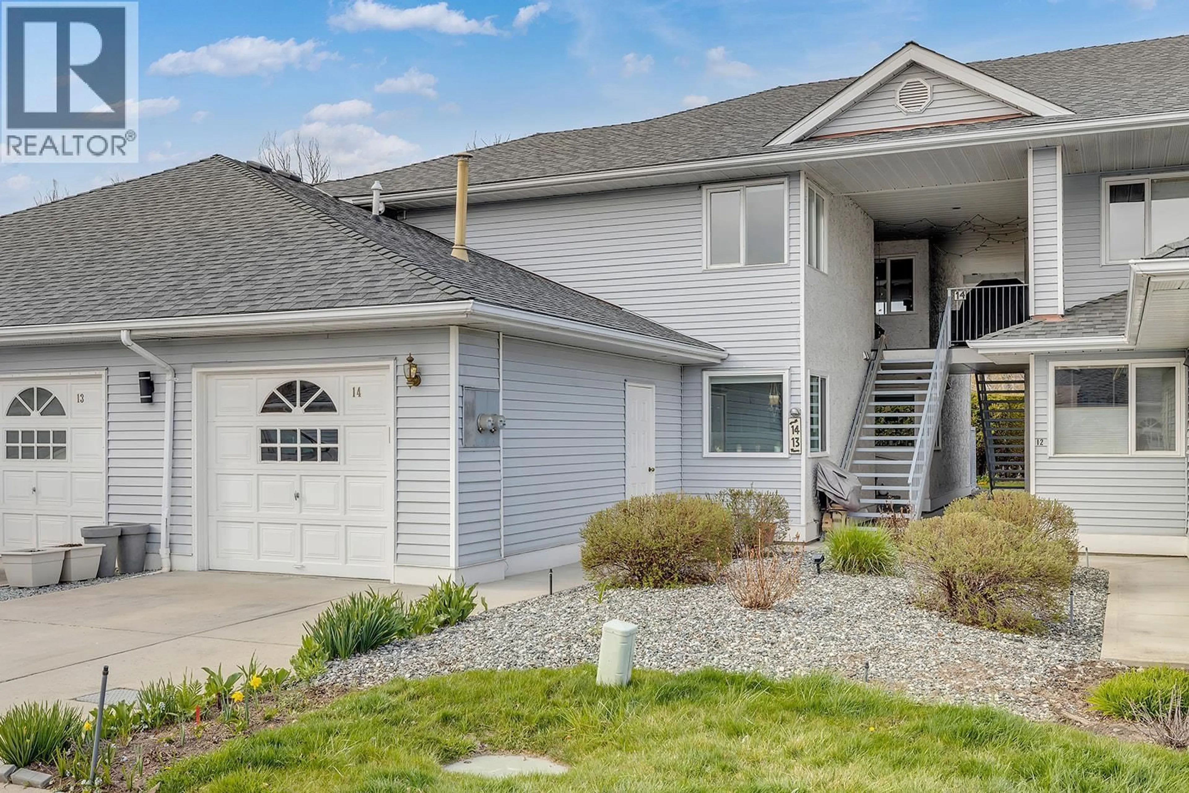 Home with vinyl exterior material, street for 14 - 3370 CASORSO ROAD, Kelowna British Columbia V1W3J2
