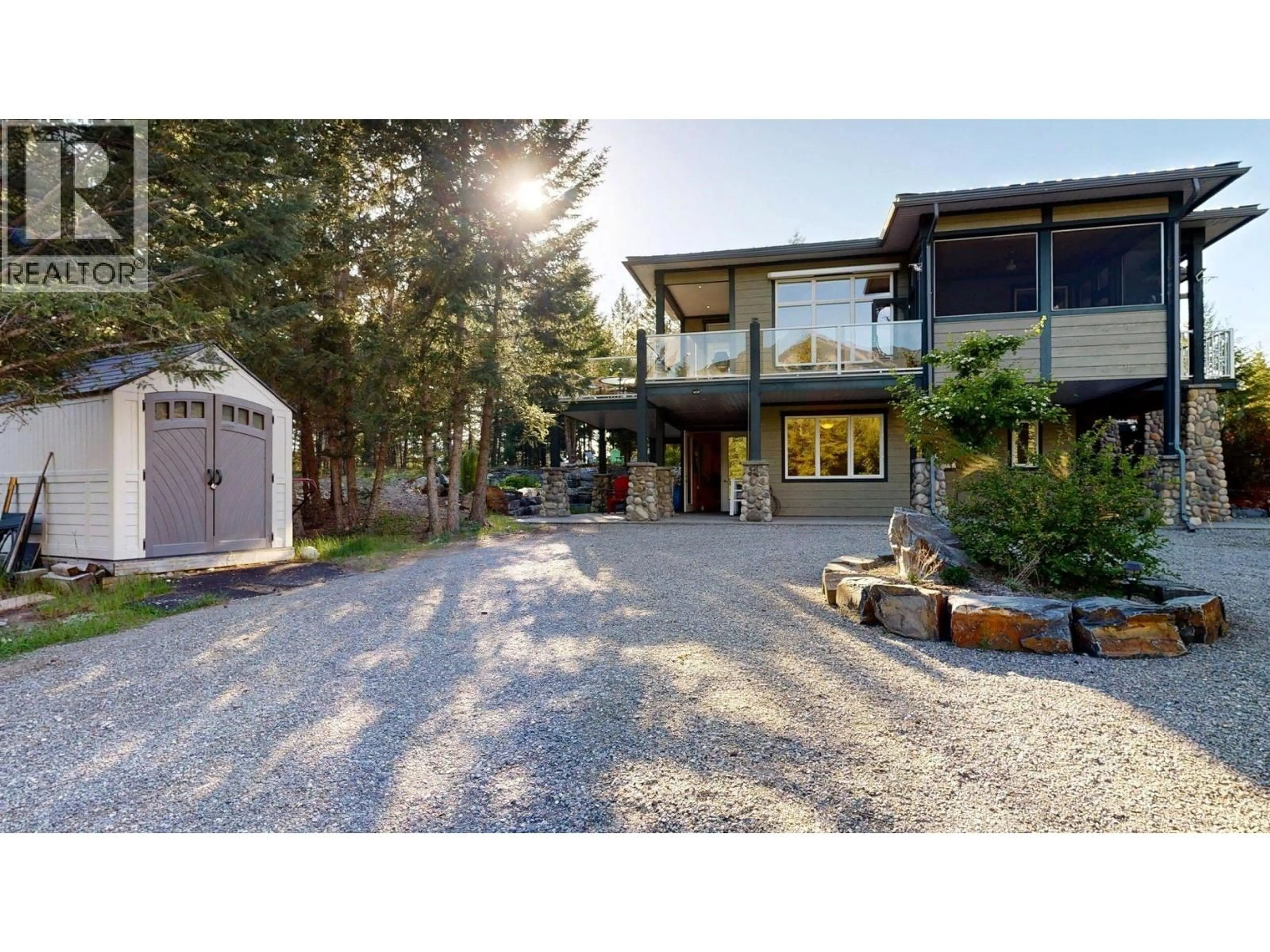 A pic from outside/outdoor area/front of a property/back of a property/a pic from drone, street for 9395 PINTO ROAD, Invermere British Columbia V0A1K2