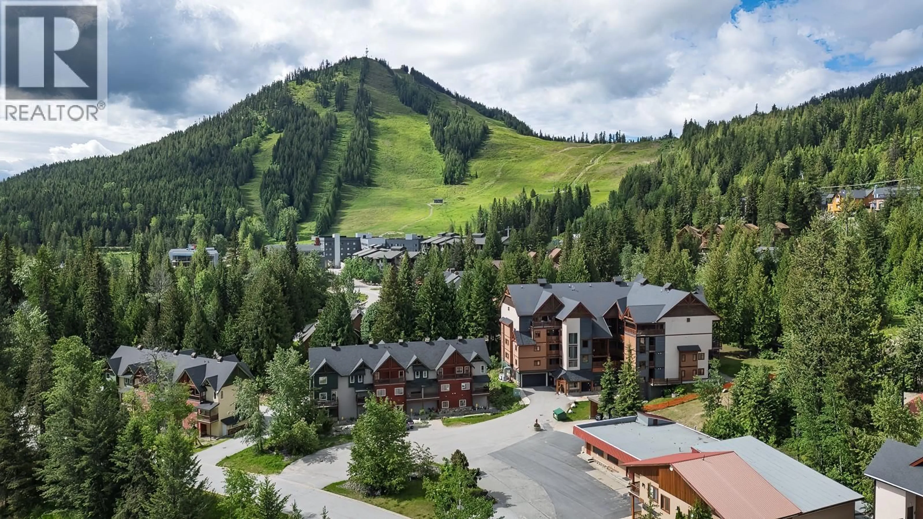 A pic from outside/outdoor area/front of a property/back of a property/a pic from drone, mountain view for 2E - 1005 MOUNTAIN VIEW ROAD, Rossland British Columbia V0G1Y0