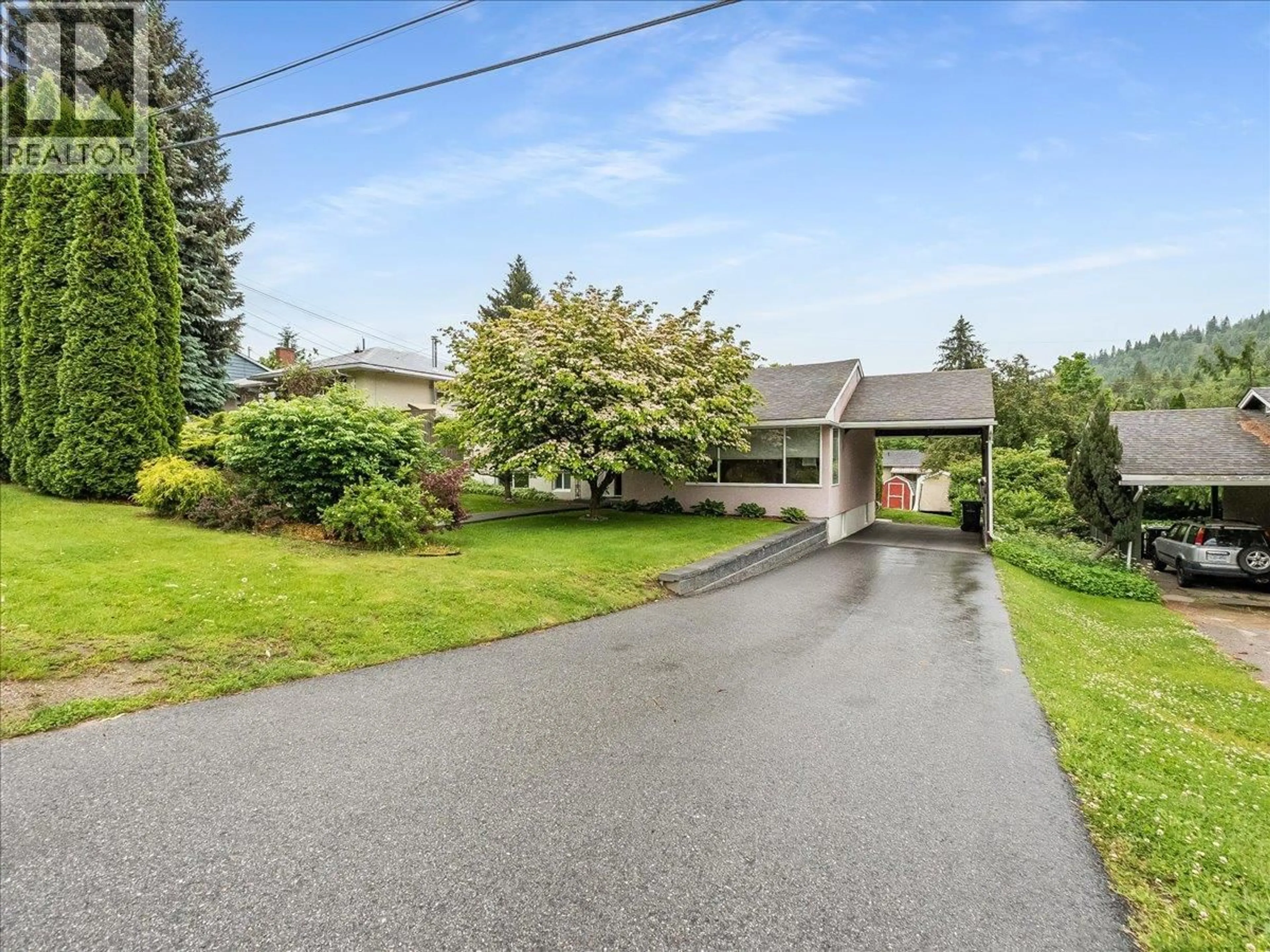 A pic from outside/outdoor area/front of a property/back of a property/a pic from drone, street for 806 10TH STREET, Castlegar British Columbia V1N2H8