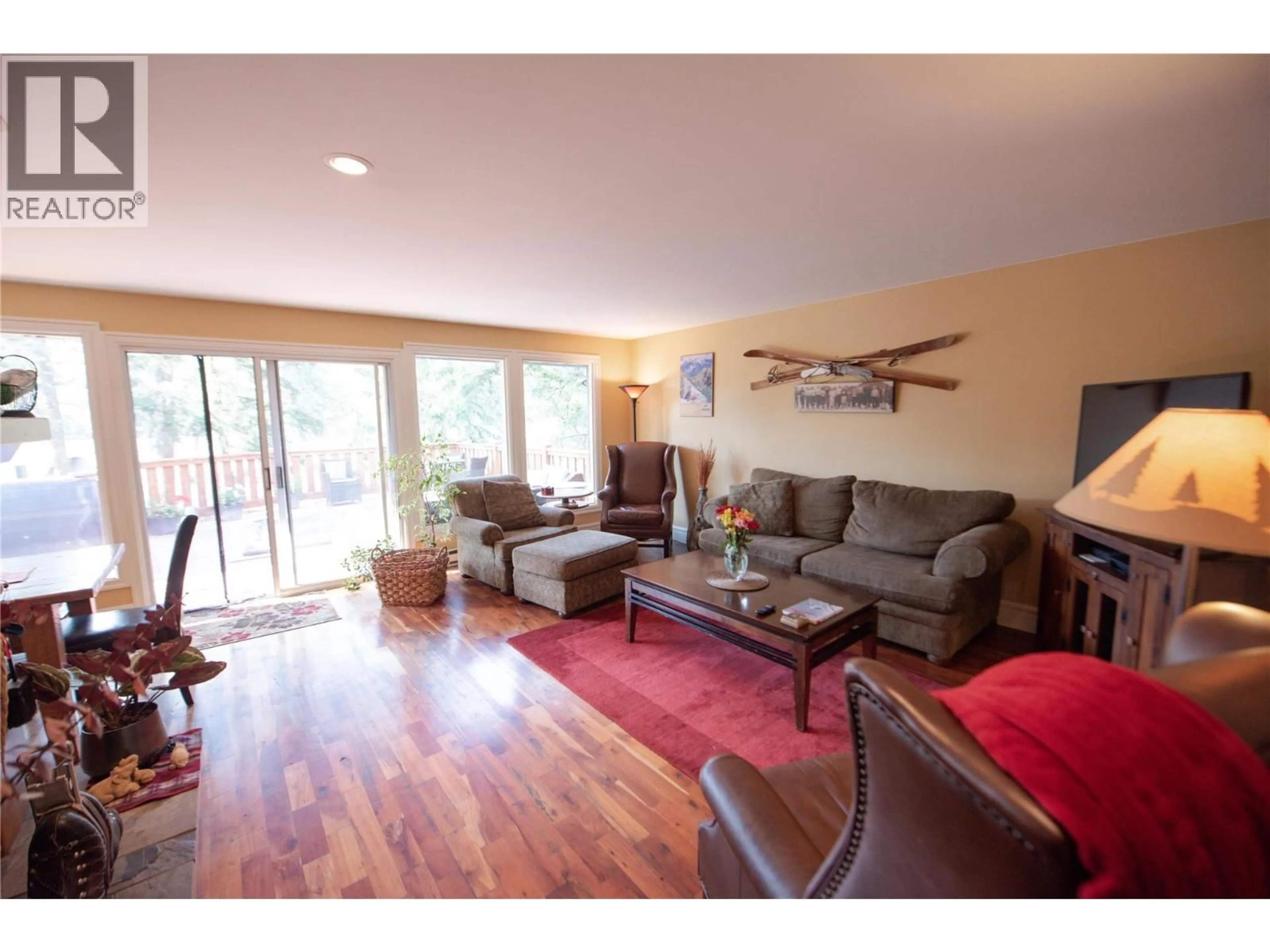 Living room with furniture, wood/laminate floor for 1306 SELKIRK DRIVE, Golden British Columbia V0A1H6