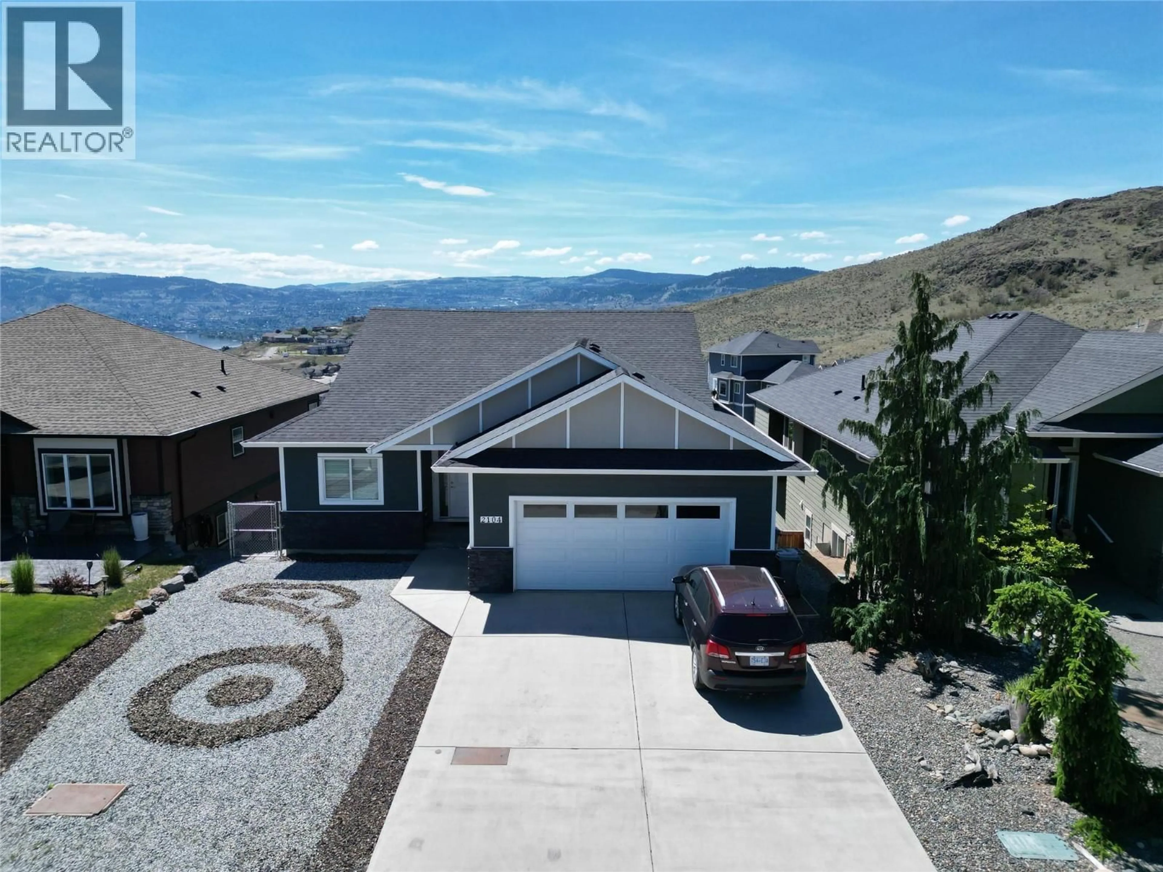 A pic from outside/outdoor area/front of a property/back of a property/a pic from drone, mountain view for 2104 DOUBLETREE CRESCENT, Kamloops British Columbia V2B0E9