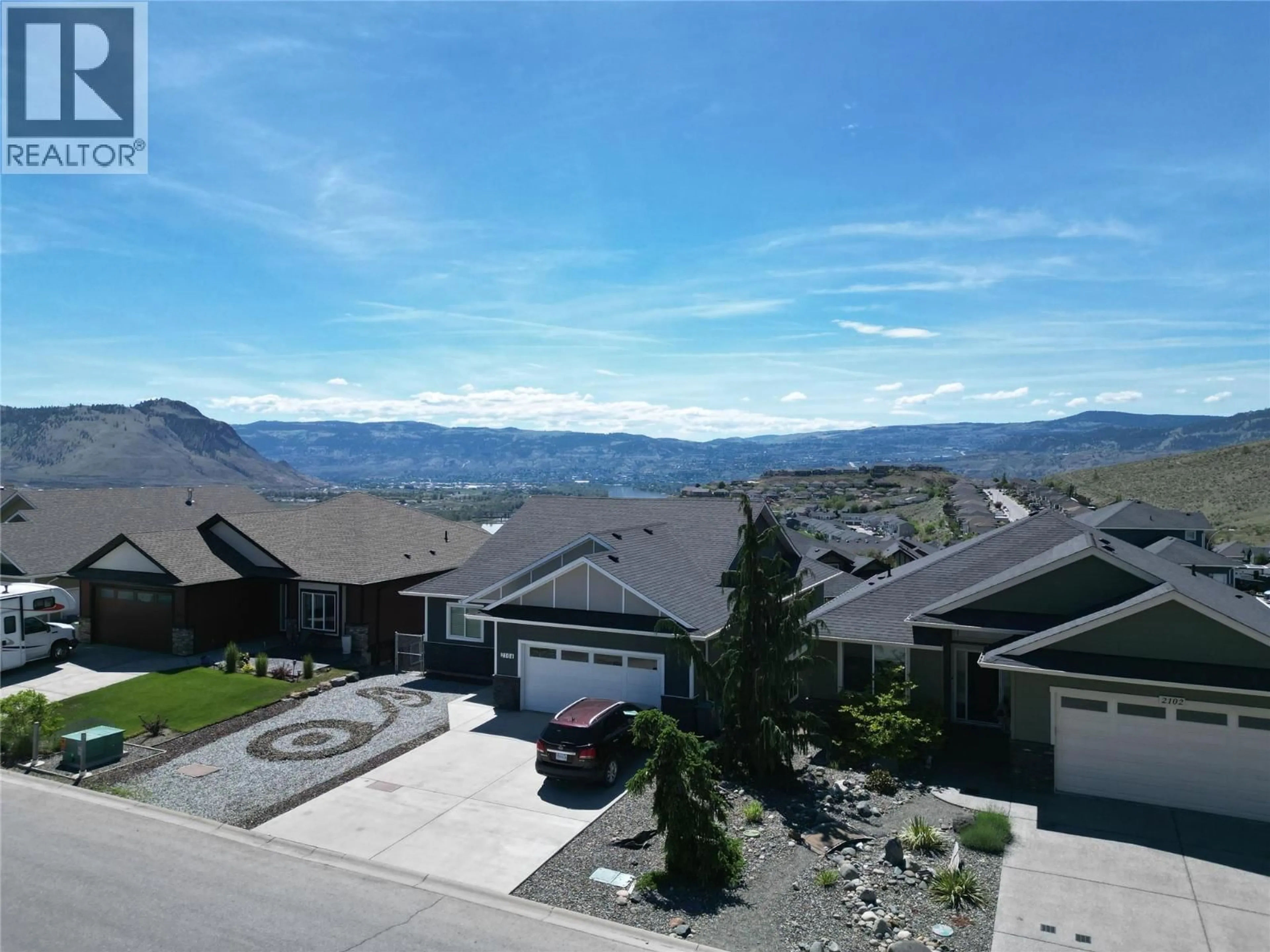 A pic from outside/outdoor area/front of a property/back of a property/a pic from drone, mountain view for 2104 DOUBLETREE CRESCENT, Kamloops British Columbia V2B0E9