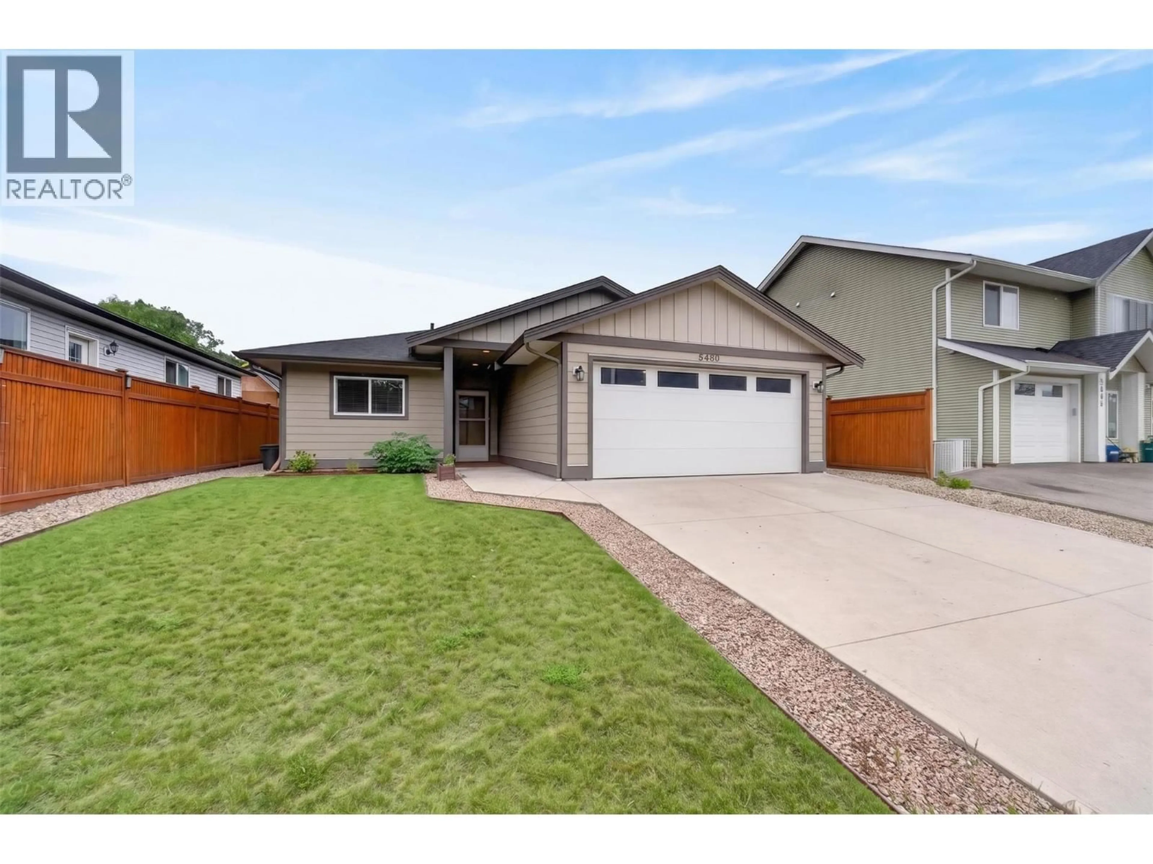 Home with vinyl exterior material, street for 5480 CANOE BEACH DRIVE NORTHEAST, Salmon Arm British Columbia V1E2M5